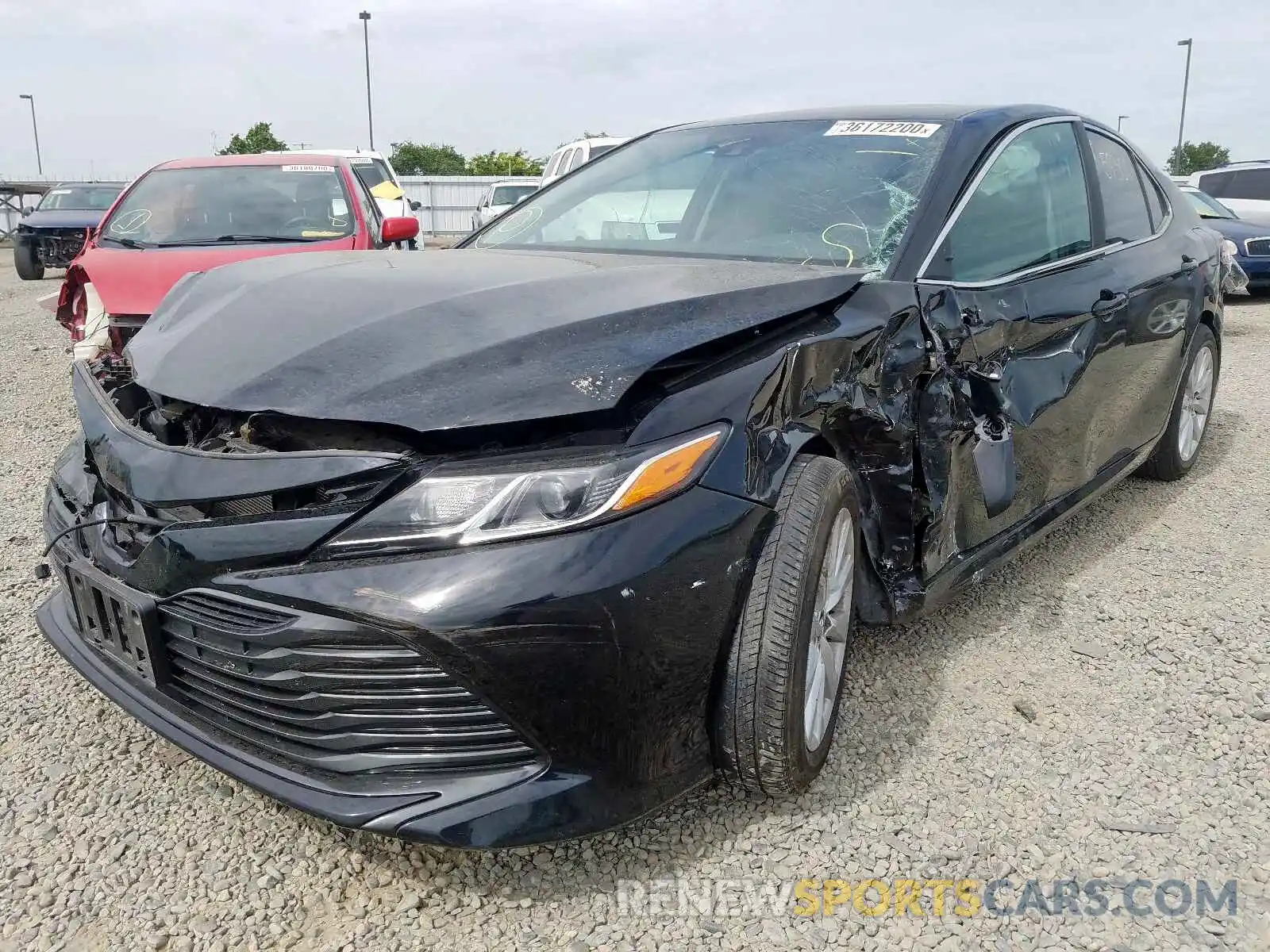 2 Photograph of a damaged car 4T1B11HK4KU196288 TOYOTA CAMRY 2019