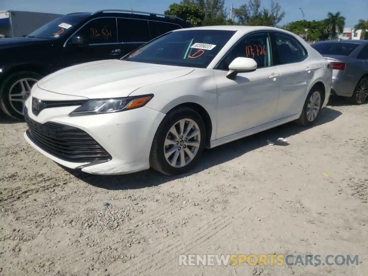 2 Photograph of a damaged car 4T1B11HK4KU197649 TOYOTA CAMRY 2019