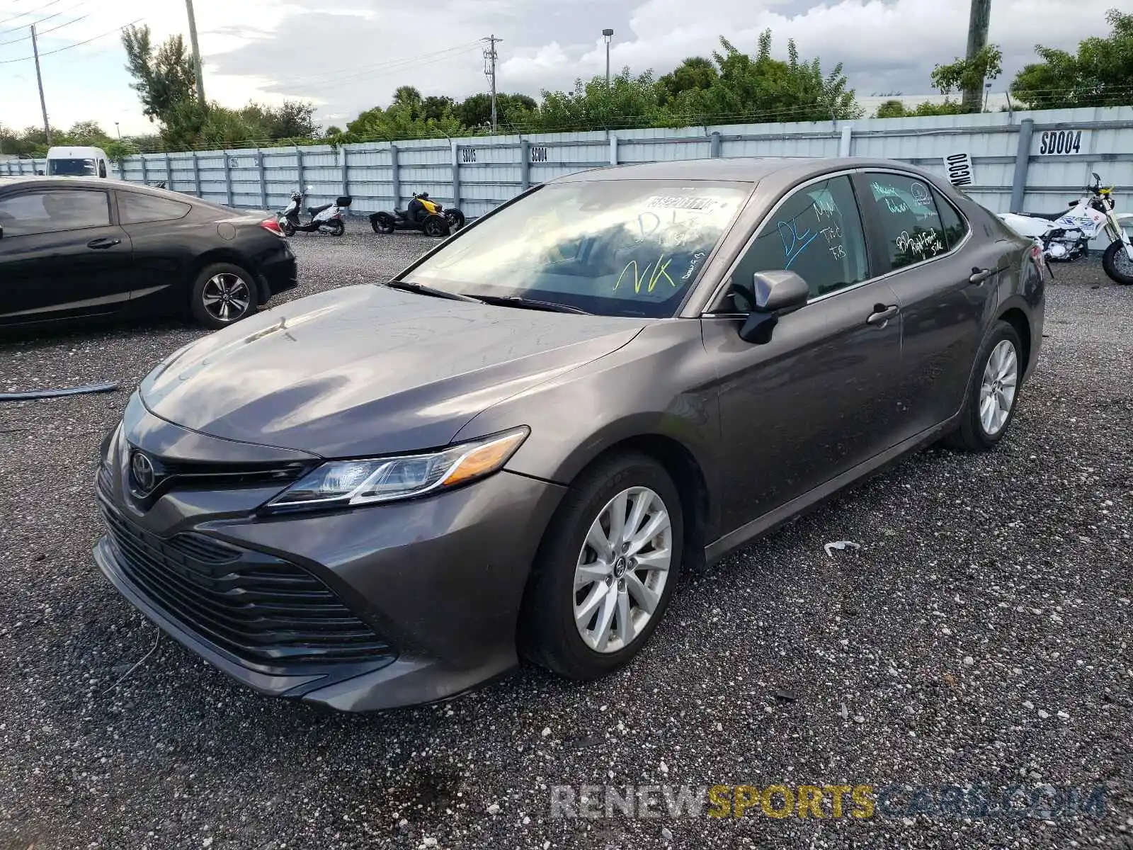 2 Photograph of a damaged car 4T1B11HK4KU197795 TOYOTA CAMRY 2019