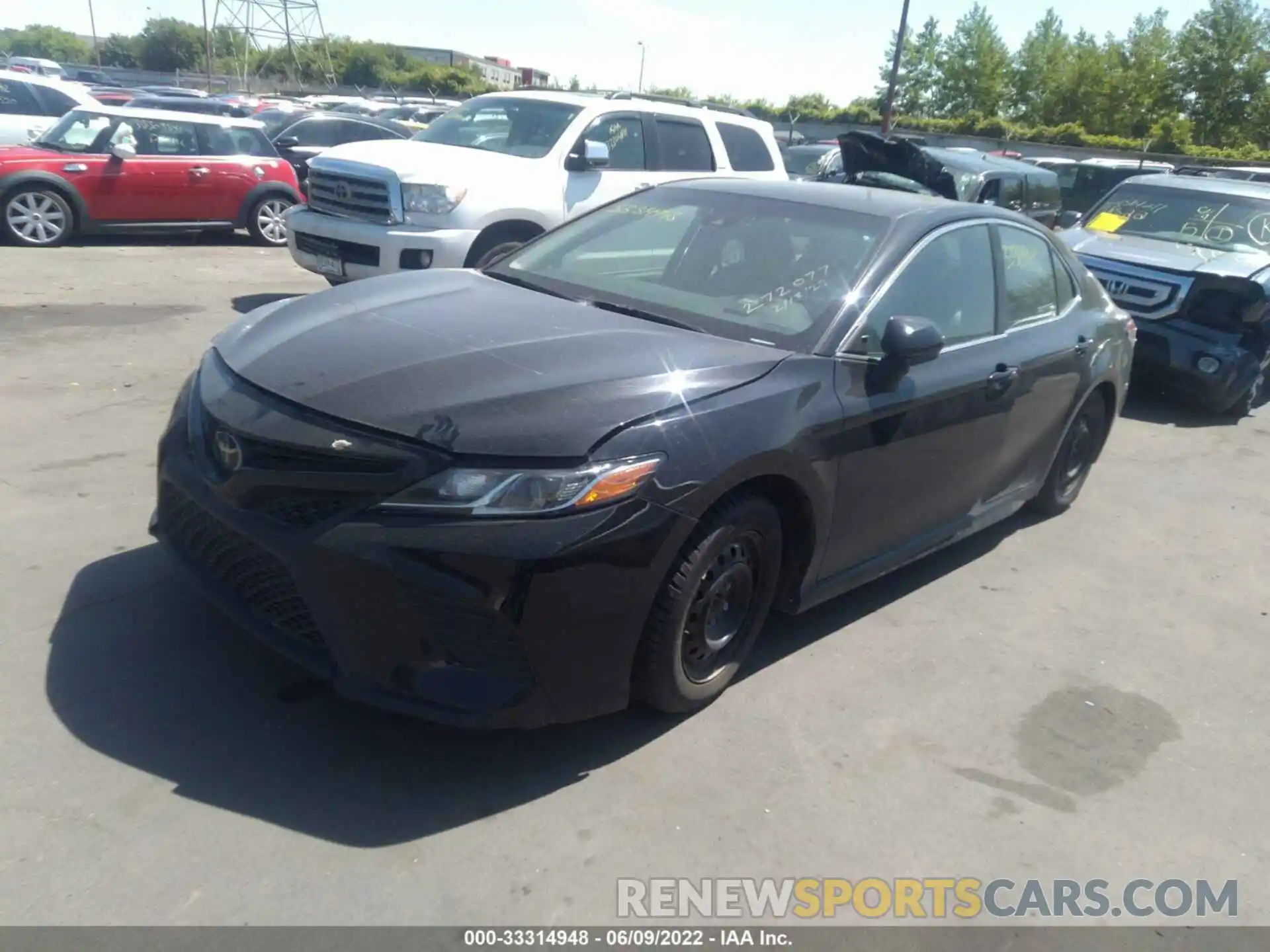 2 Photograph of a damaged car 4T1B11HK4KU198817 TOYOTA CAMRY 2019