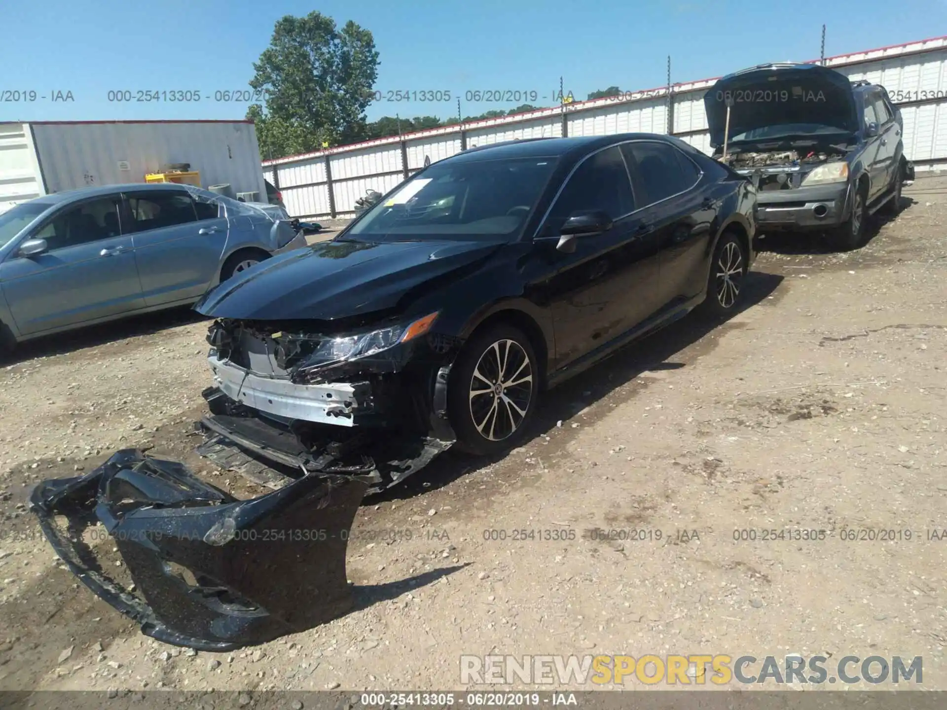 2 Photograph of a damaged car 4T1B11HK4KU199031 TOYOTA CAMRY 2019