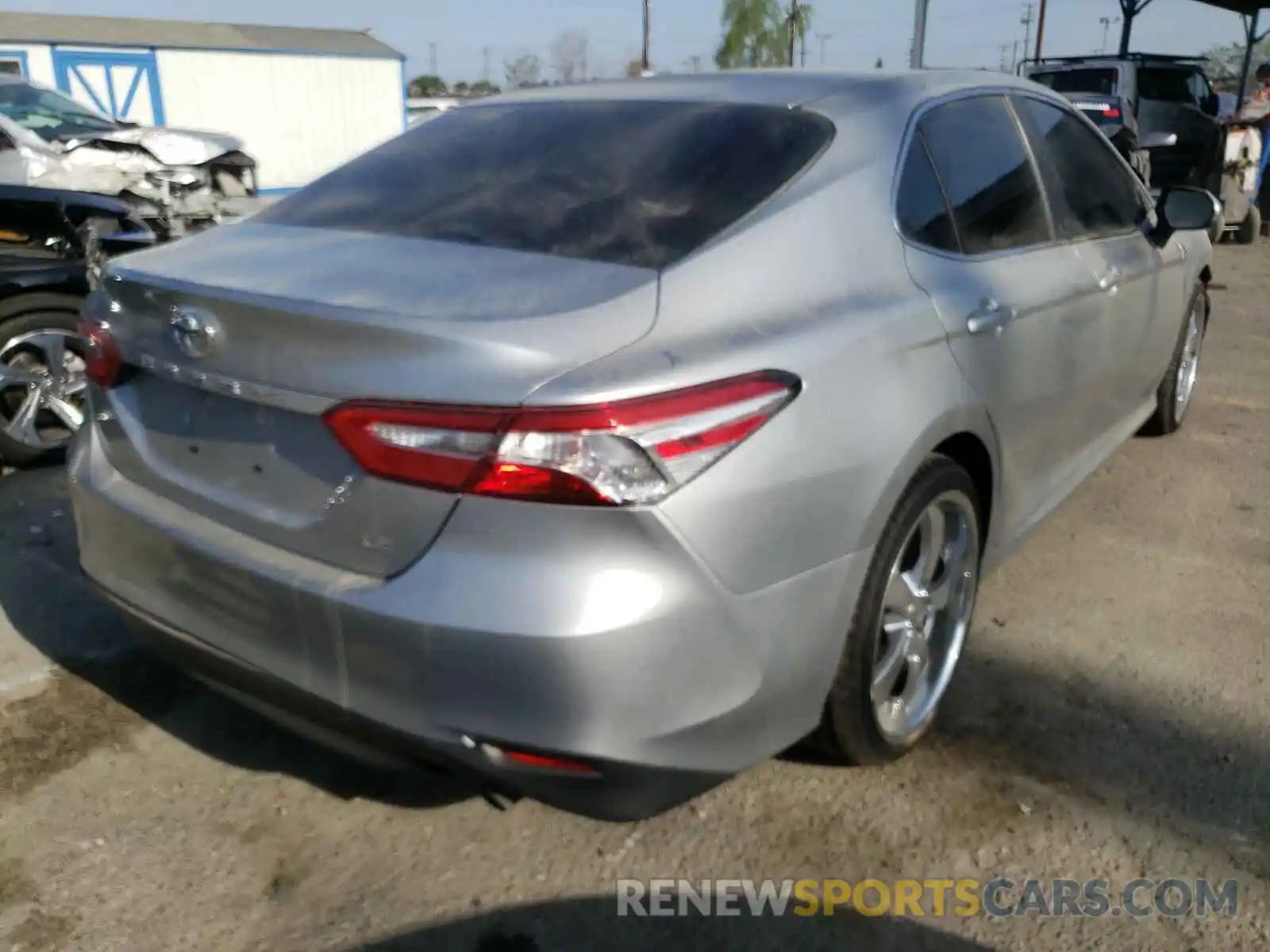 4 Photograph of a damaged car 4T1B11HK4KU199319 TOYOTA CAMRY 2019