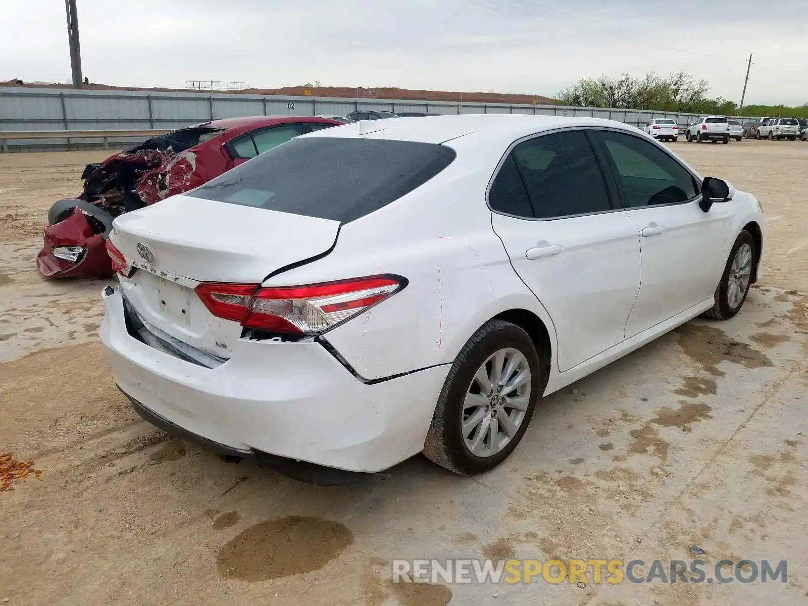 4 Photograph of a damaged car 4T1B11HK4KU200467 TOYOTA CAMRY 2019