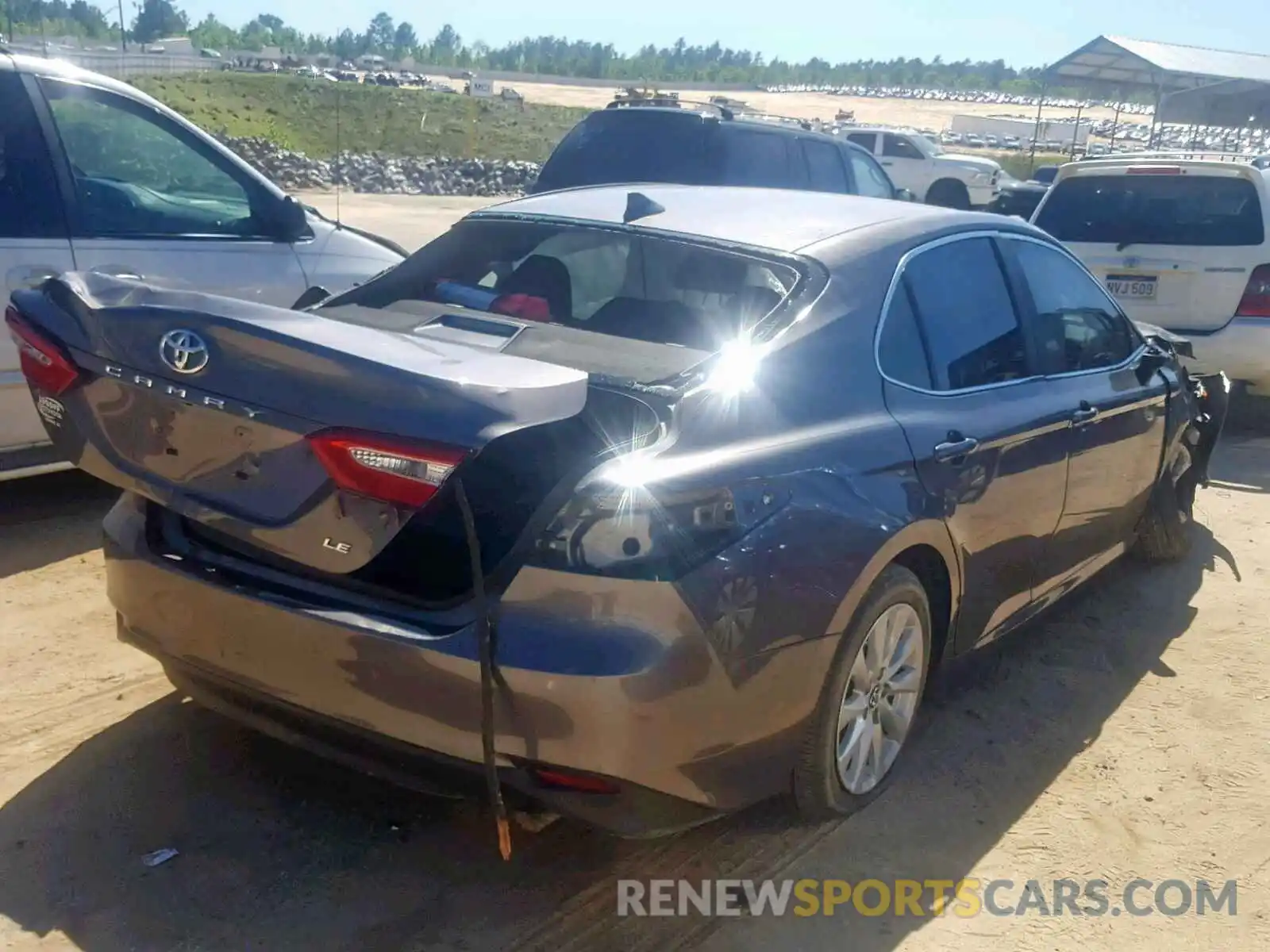 4 Photograph of a damaged car 4T1B11HK4KU200890 TOYOTA CAMRY 2019