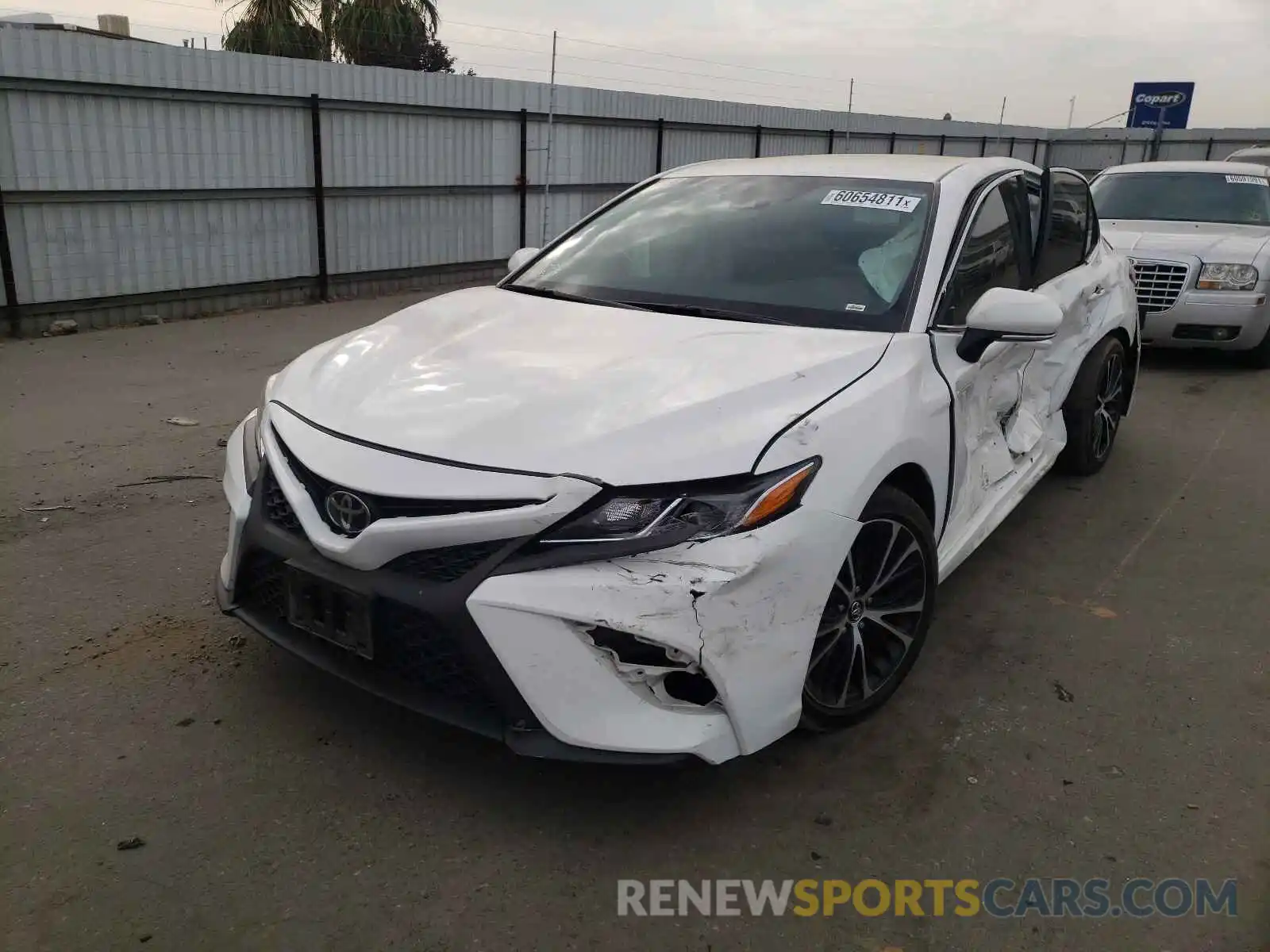 2 Photograph of a damaged car 4T1B11HK4KU201280 TOYOTA CAMRY 2019