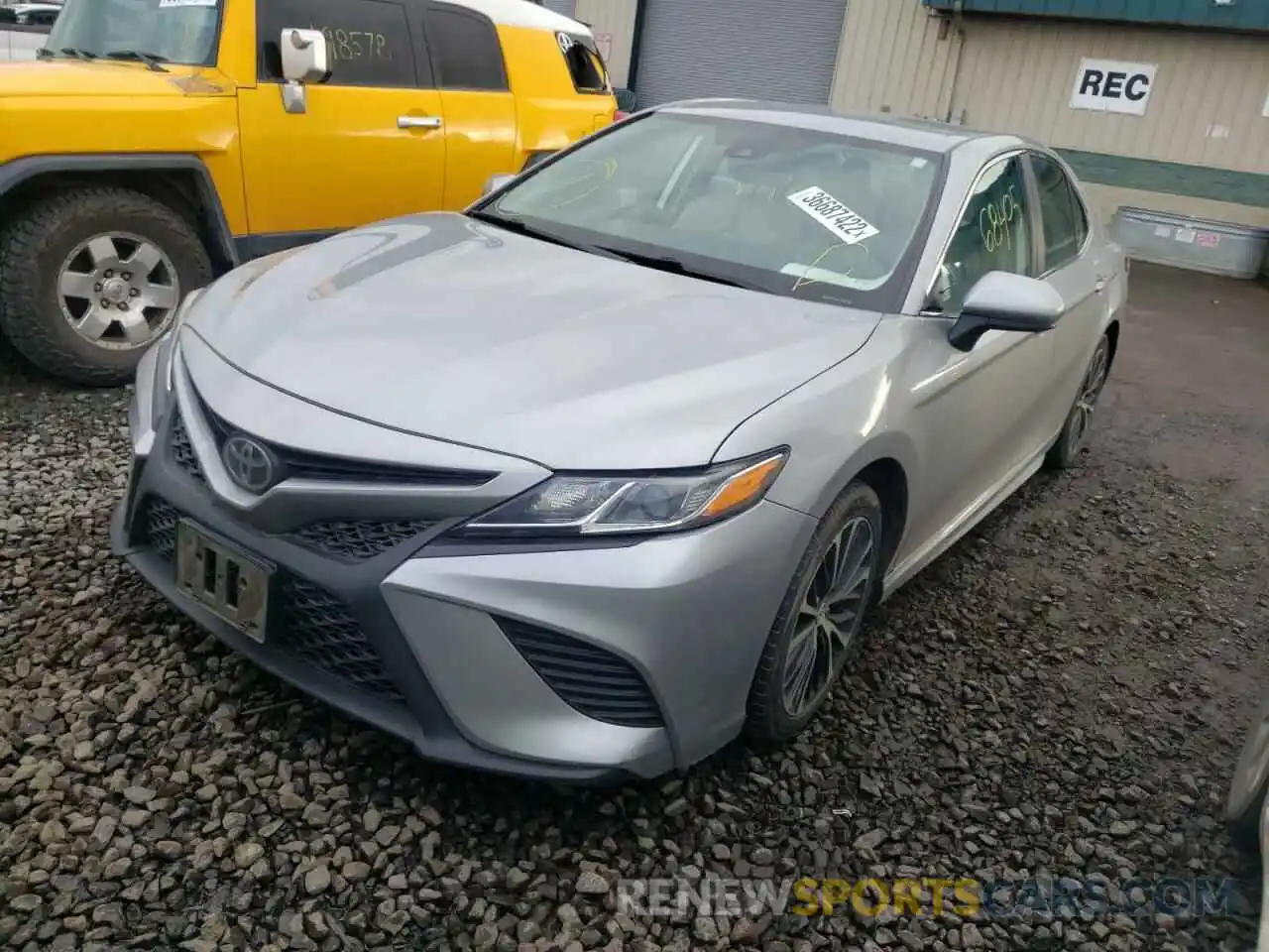 2 Photograph of a damaged car 4T1B11HK4KU201778 TOYOTA CAMRY 2019