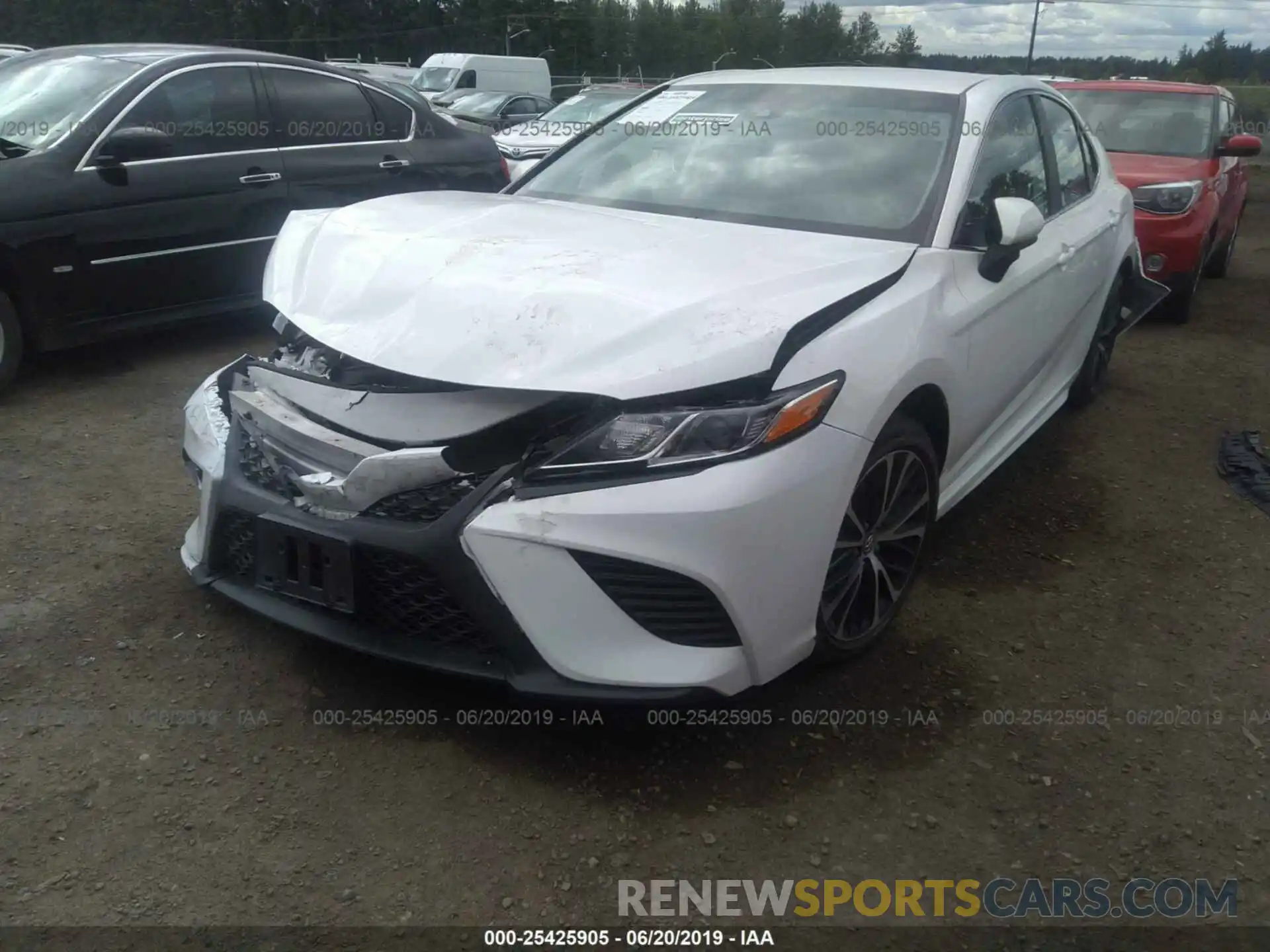 2 Photograph of a damaged car 4T1B11HK4KU201943 TOYOTA CAMRY 2019