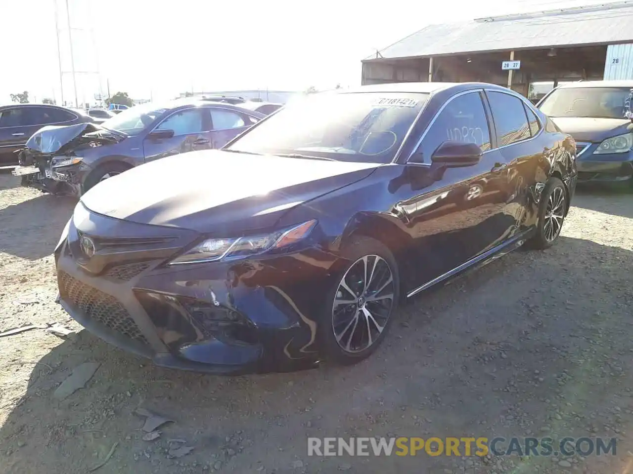 2 Photograph of a damaged car 4T1B11HK4KU203319 TOYOTA CAMRY 2019