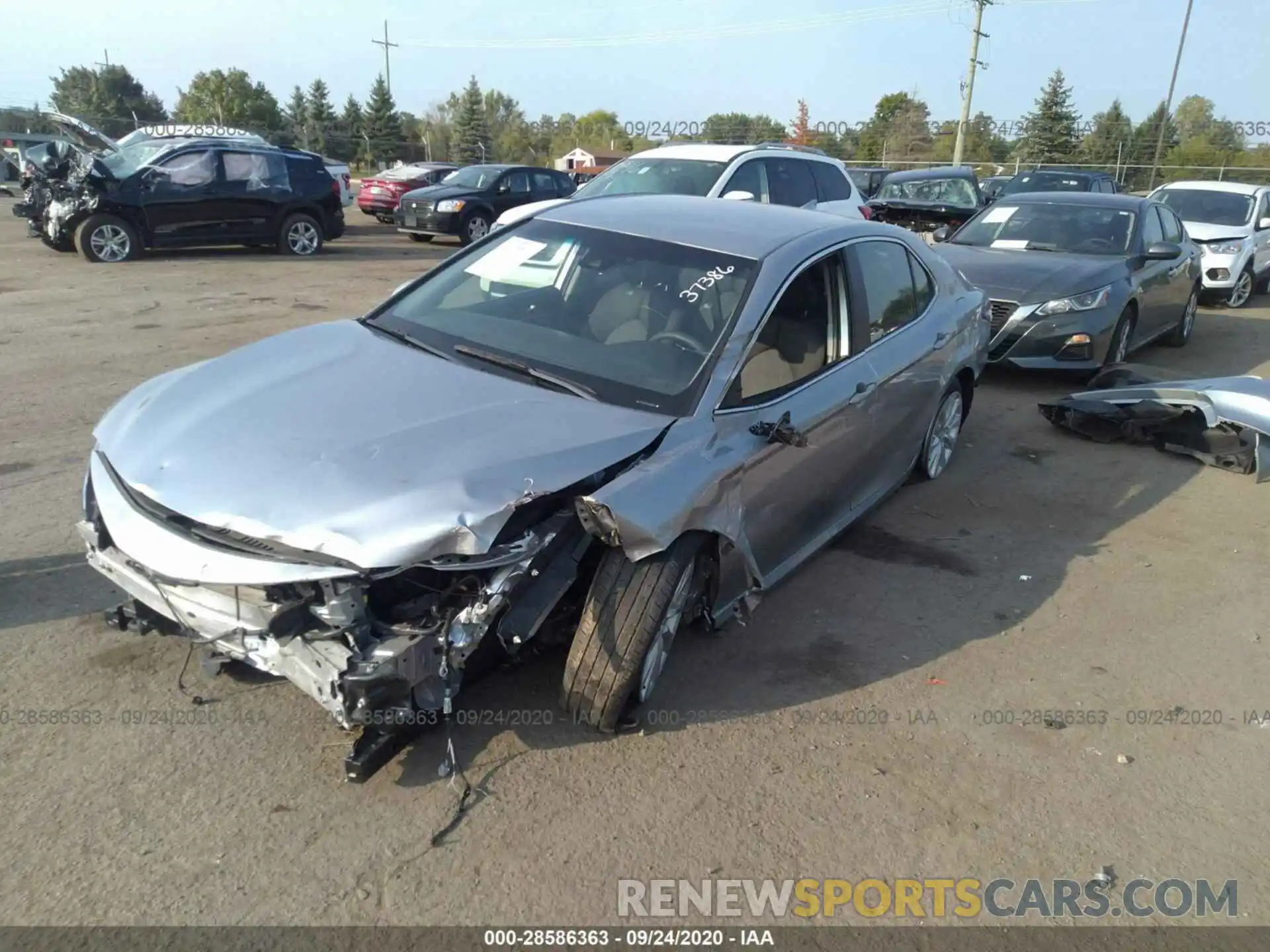 2 Photograph of a damaged car 4T1B11HK4KU205250 TOYOTA CAMRY 2019