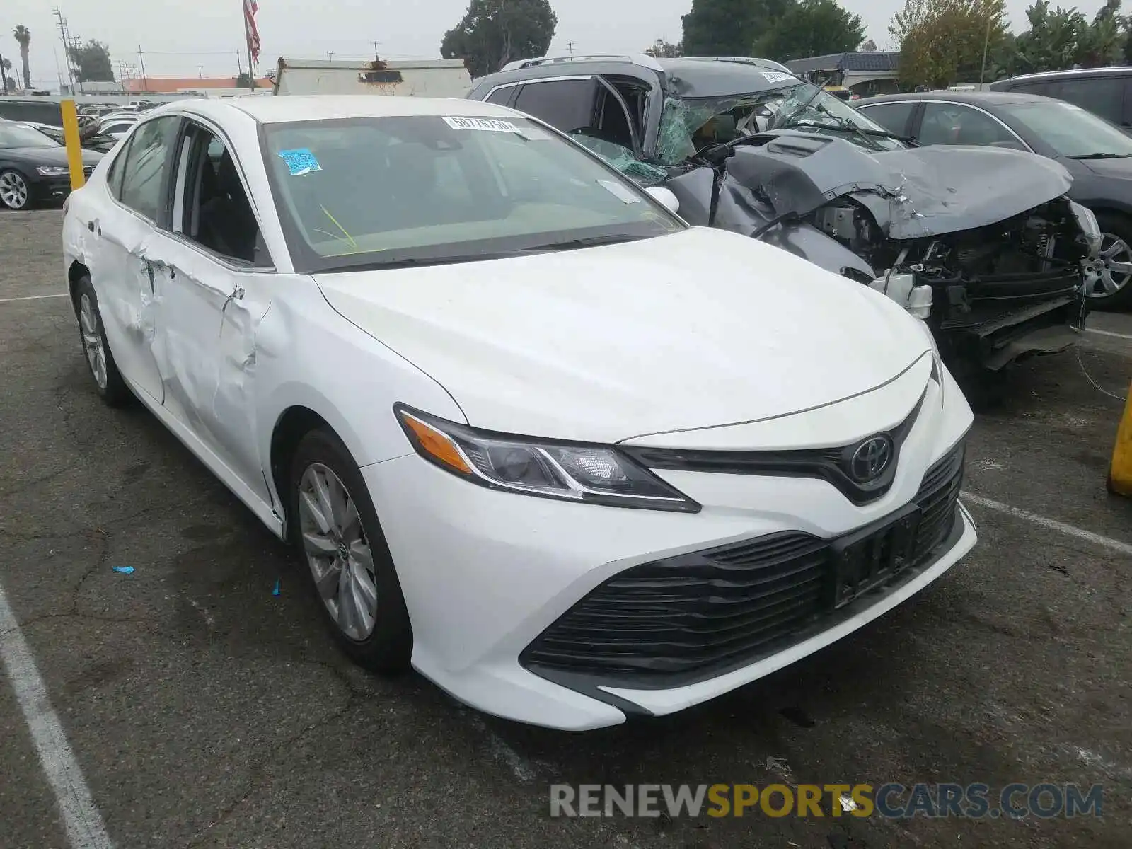 1 Photograph of a damaged car 4T1B11HK4KU205958 TOYOTA CAMRY 2019