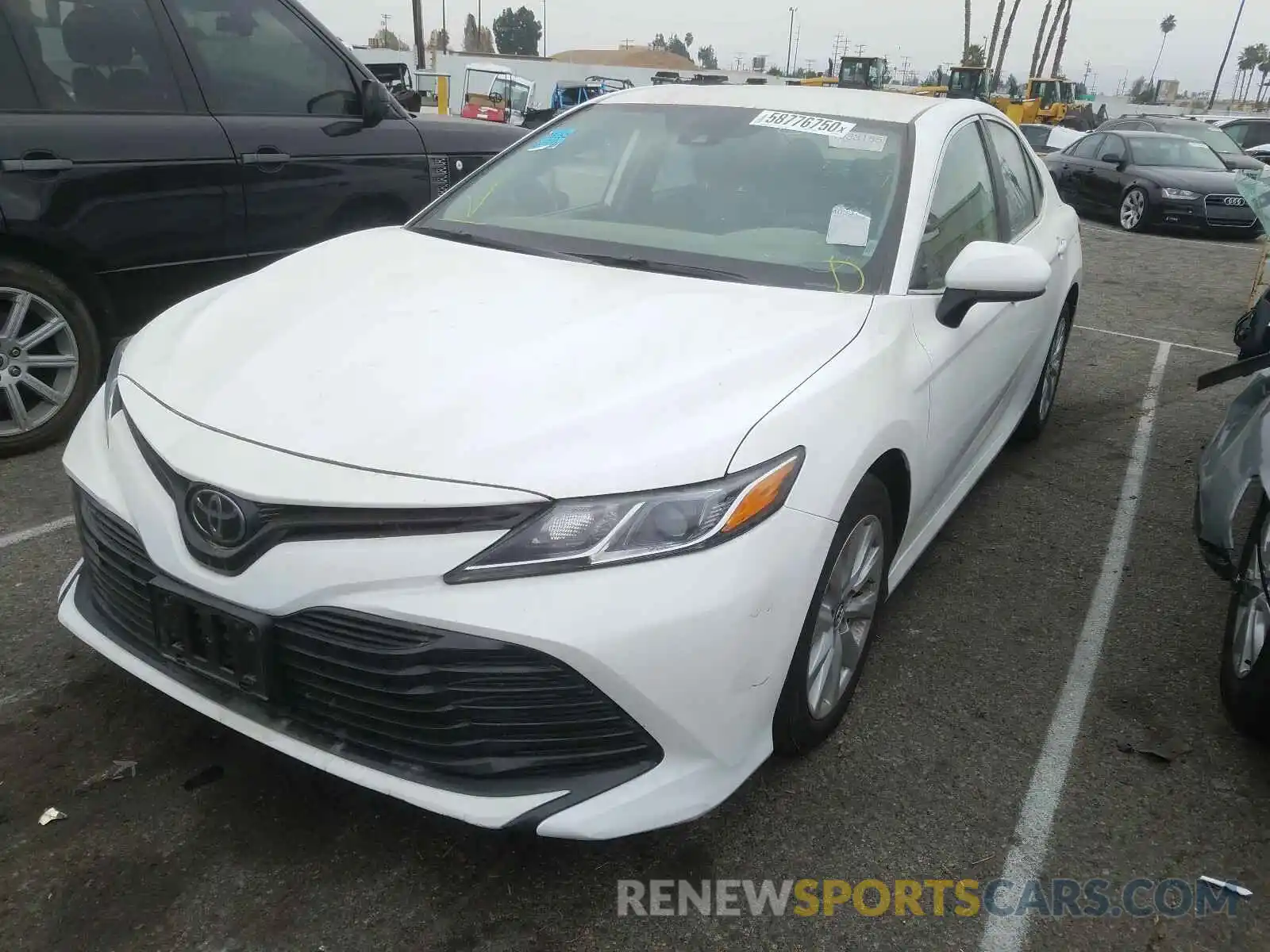 2 Photograph of a damaged car 4T1B11HK4KU205958 TOYOTA CAMRY 2019