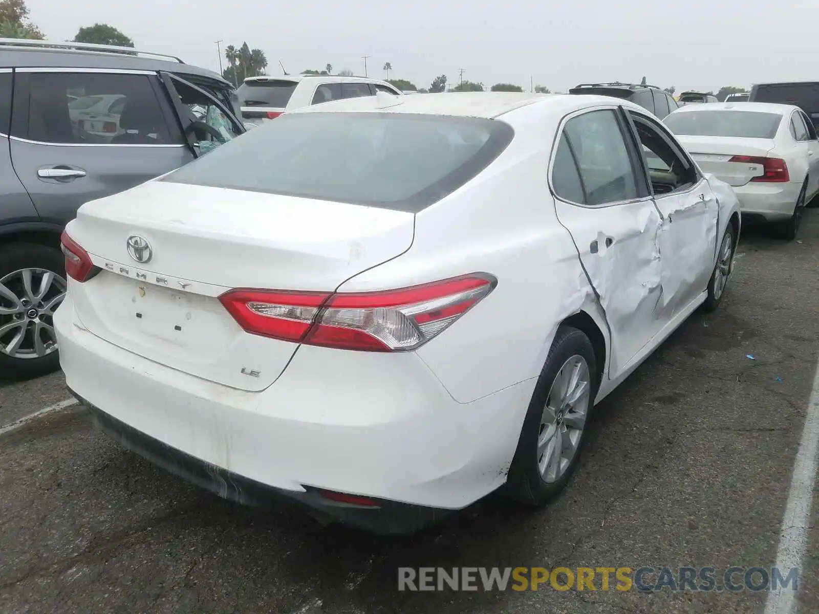 4 Photograph of a damaged car 4T1B11HK4KU205958 TOYOTA CAMRY 2019