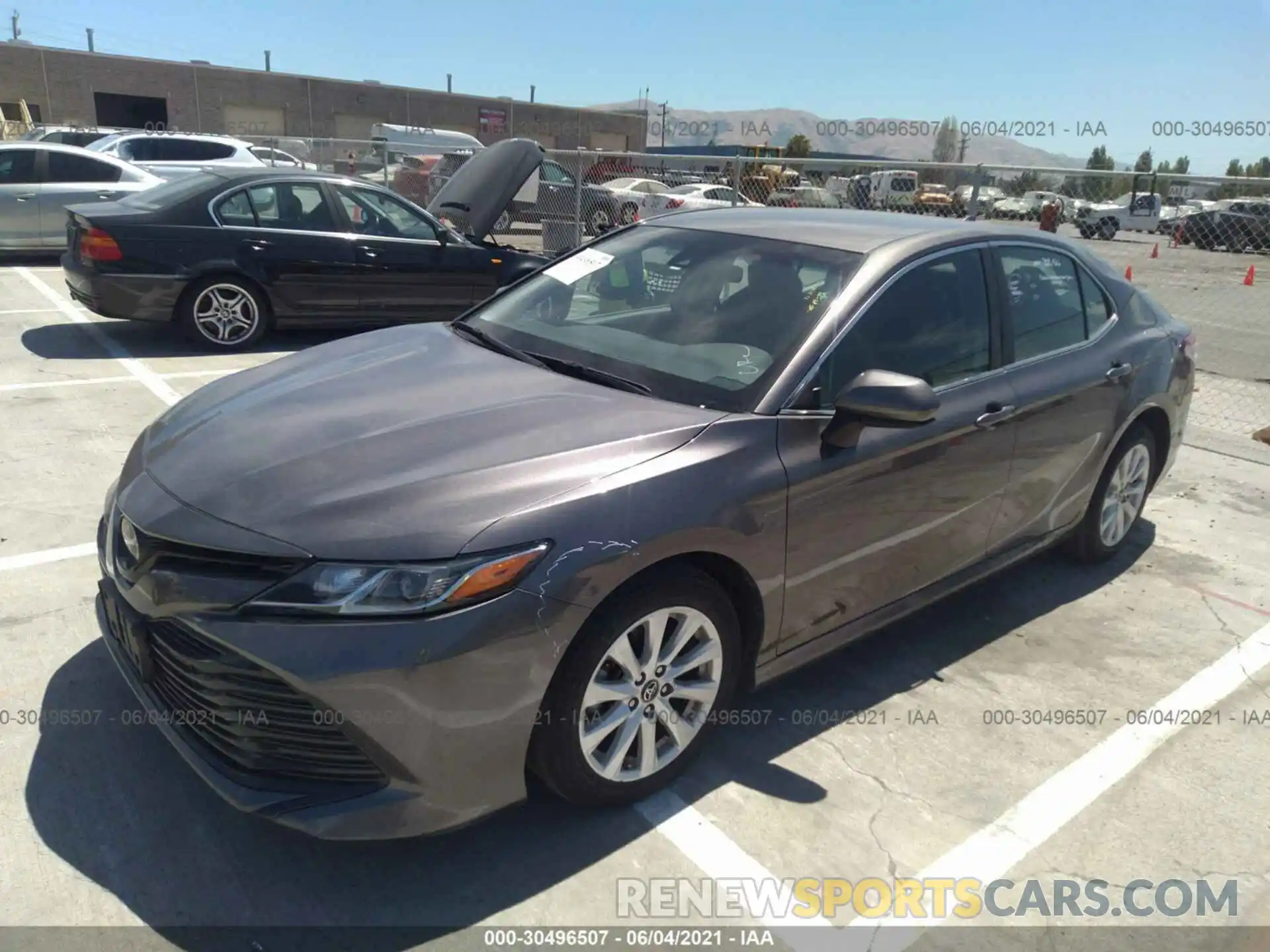 2 Photograph of a damaged car 4T1B11HK4KU206737 TOYOTA CAMRY 2019