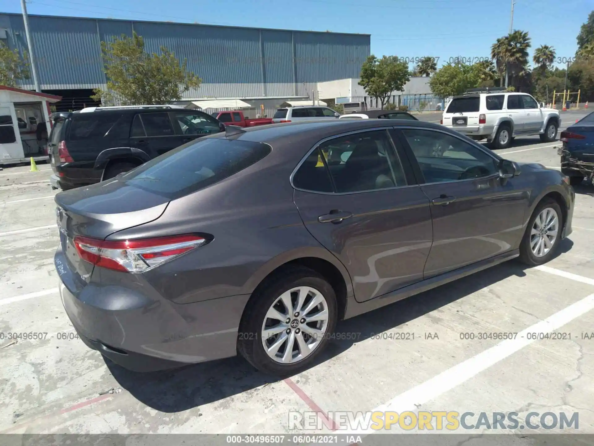 4 Photograph of a damaged car 4T1B11HK4KU206737 TOYOTA CAMRY 2019