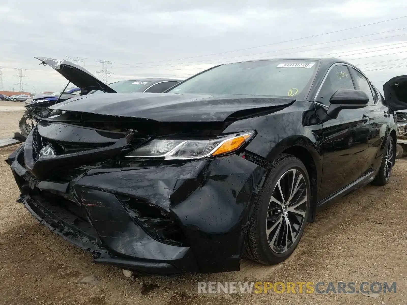 2 Photograph of a damaged car 4T1B11HK4KU209511 TOYOTA CAMRY 2019