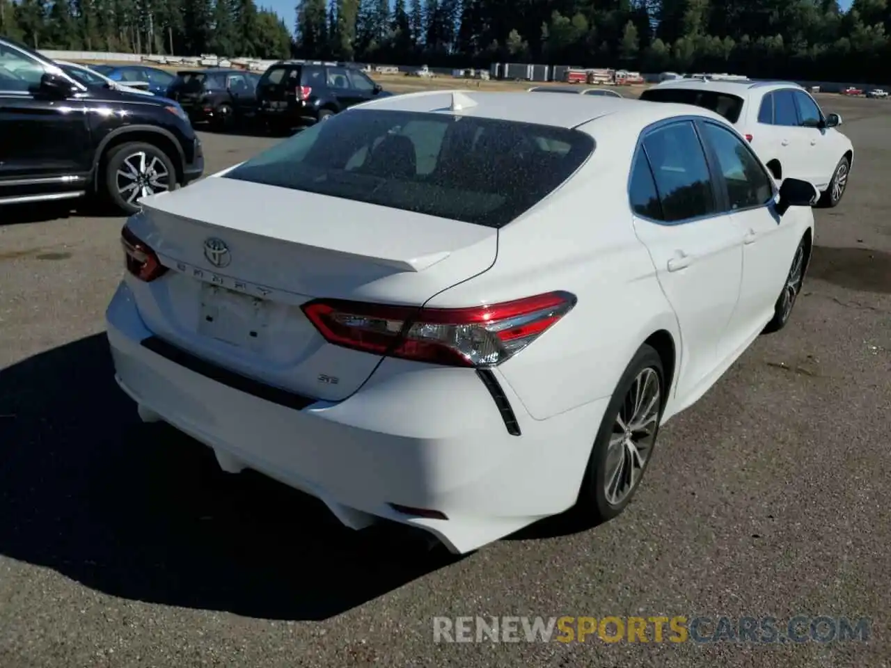 4 Photograph of a damaged car 4T1B11HK4KU209573 TOYOTA CAMRY 2019