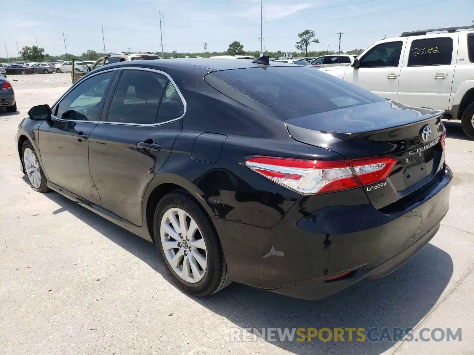 3 Photograph of a damaged car 4T1B11HK4KU210853 TOYOTA CAMRY 2019