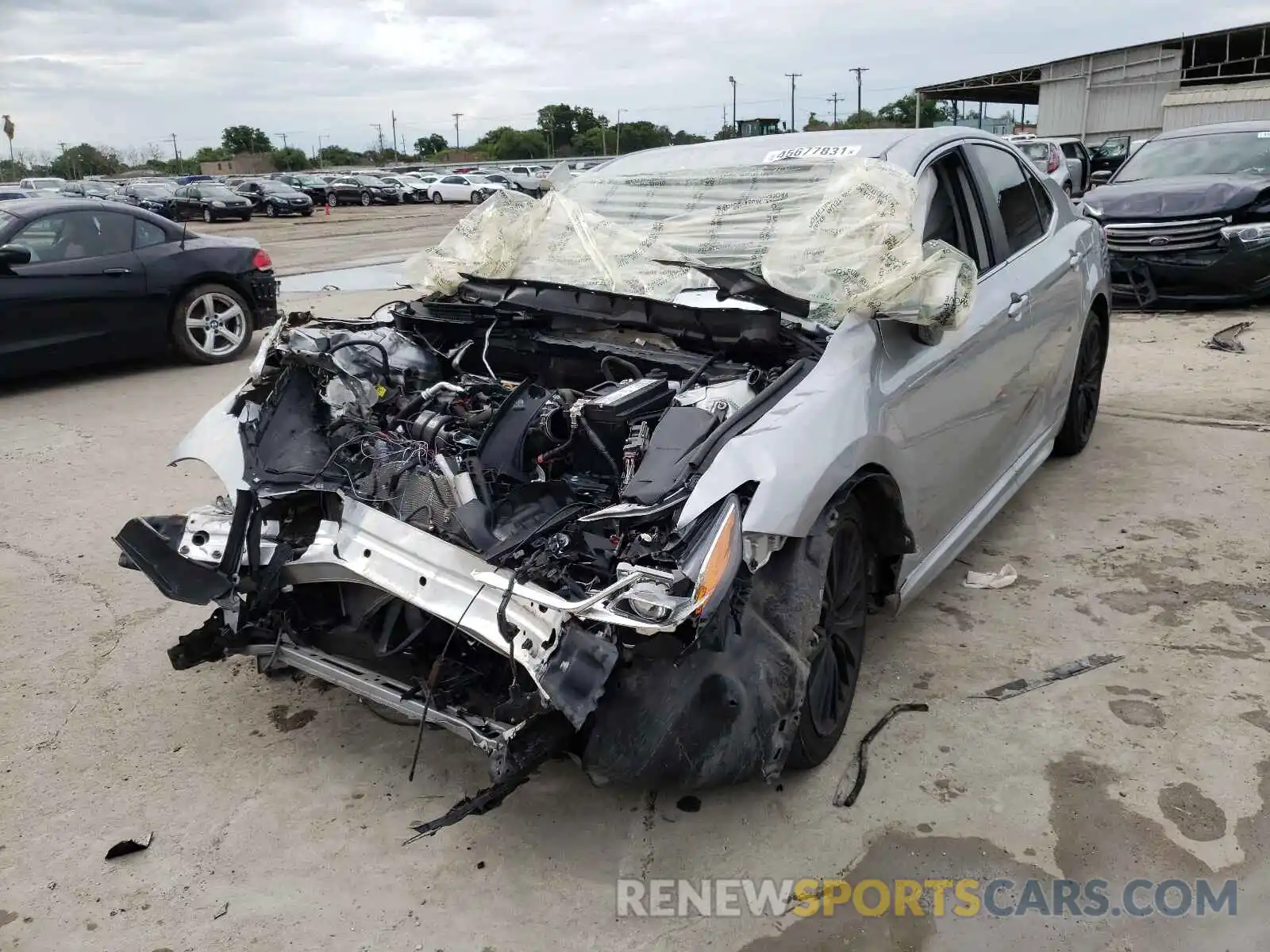 2 Photograph of a damaged car 4T1B11HK4KU211159 TOYOTA CAMRY 2019