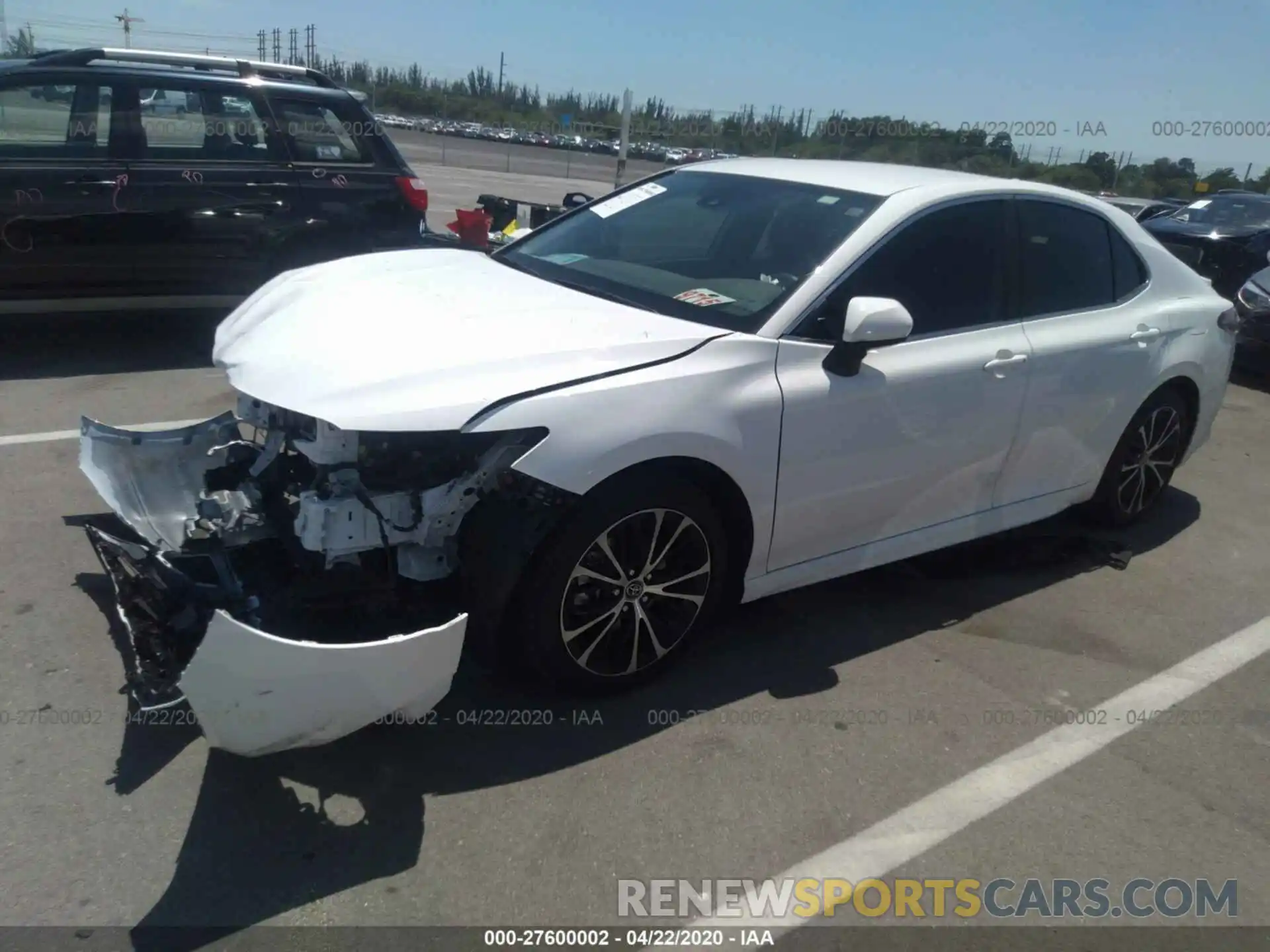 2 Photograph of a damaged car 4T1B11HK4KU213624 TOYOTA CAMRY 2019