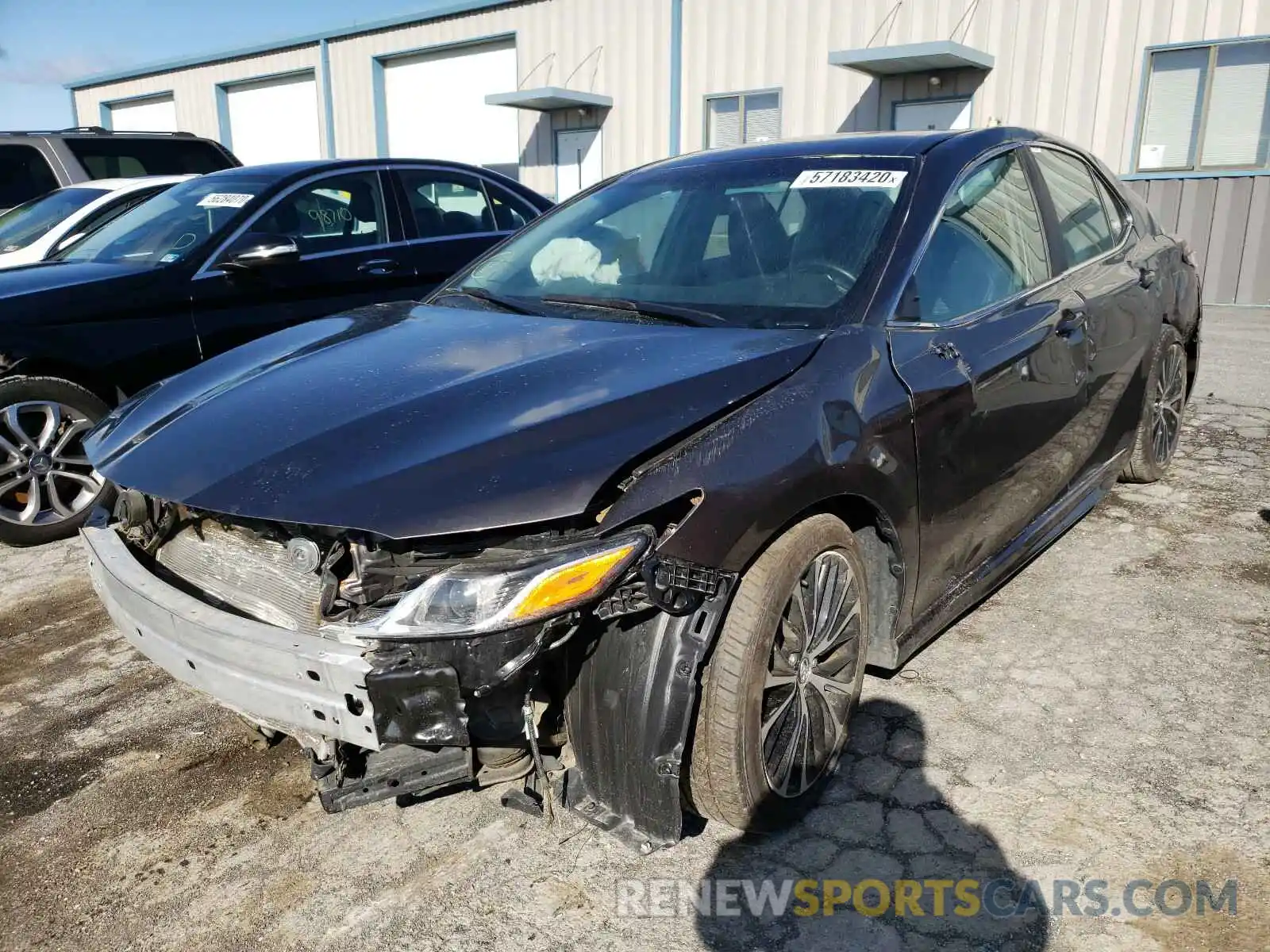 2 Photograph of a damaged car 4T1B11HK4KU215003 TOYOTA CAMRY 2019