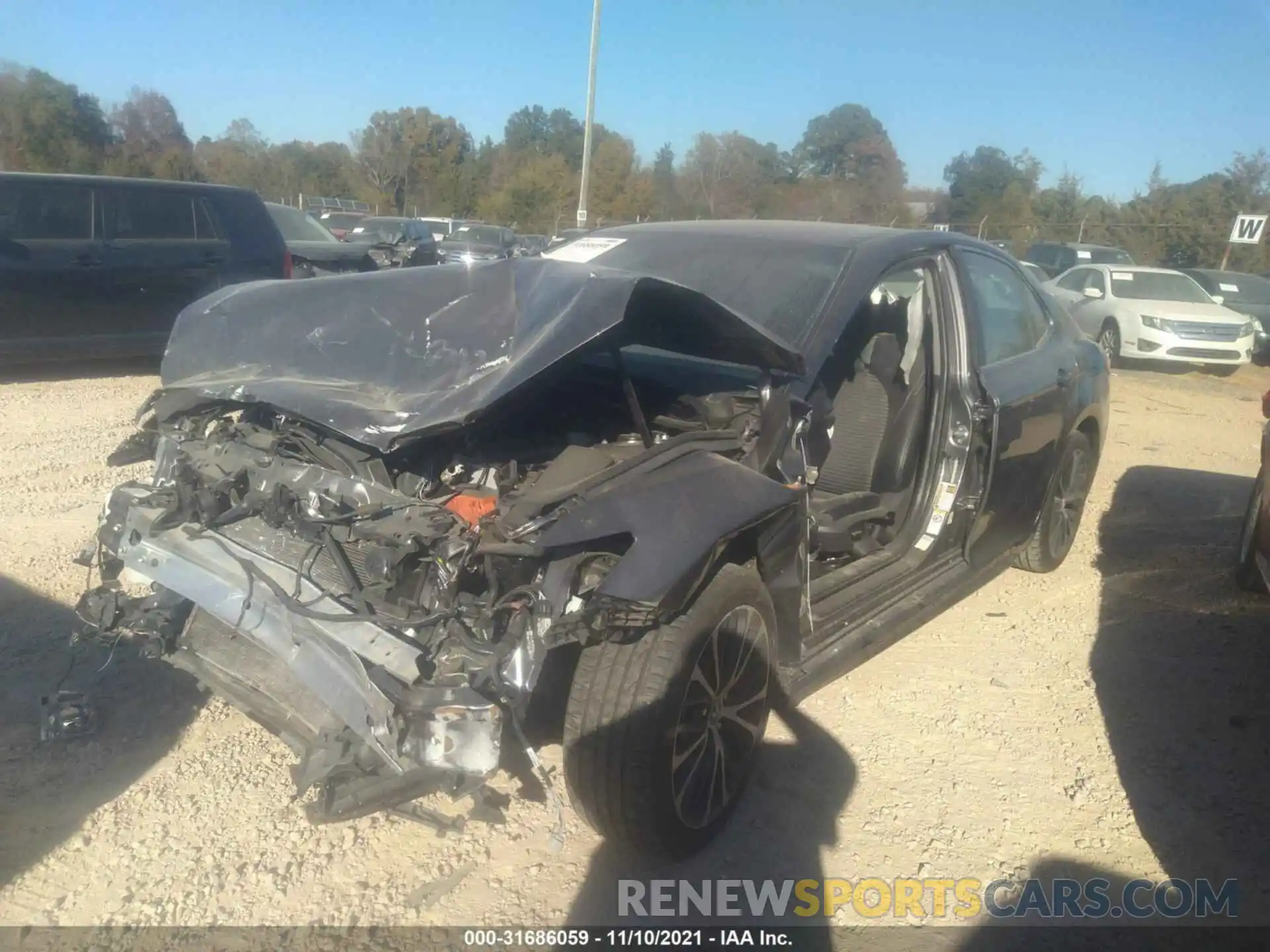 2 Photograph of a damaged car 4T1B11HK4KU215678 TOYOTA CAMRY 2019