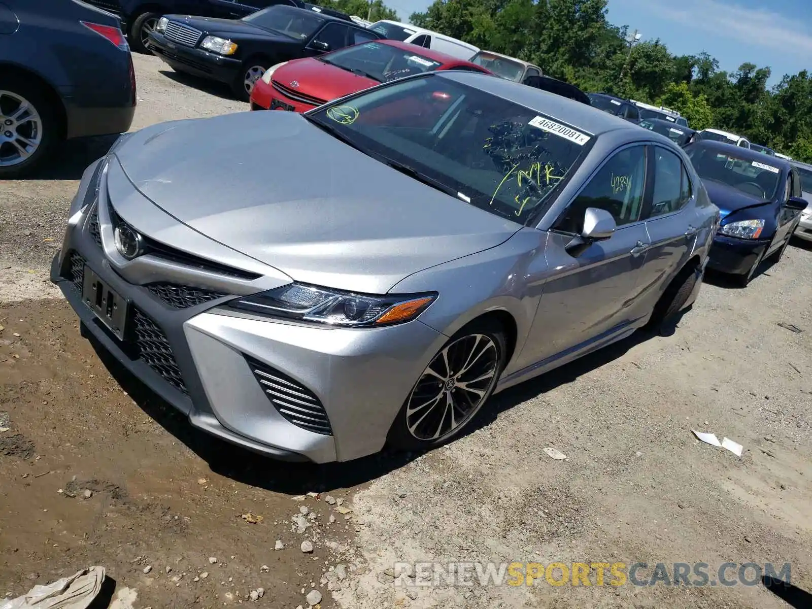 2 Photograph of a damaged car 4T1B11HK4KU216460 TOYOTA CAMRY 2019