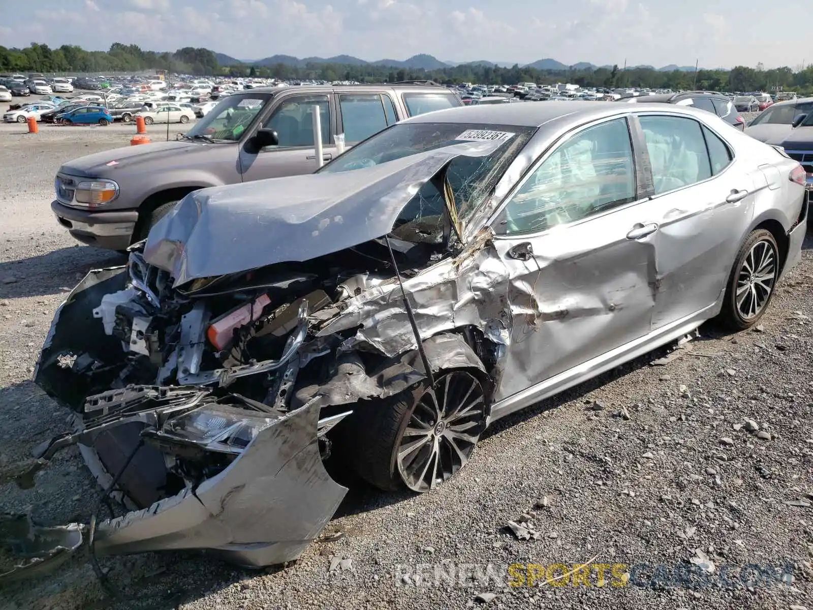 2 Photograph of a damaged car 4T1B11HK4KU217463 TOYOTA CAMRY 2019