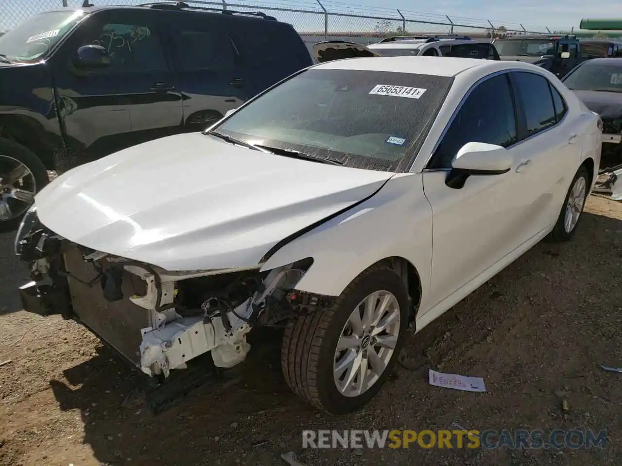 2 Photograph of a damaged car 4T1B11HK4KU217835 TOYOTA CAMRY 2019