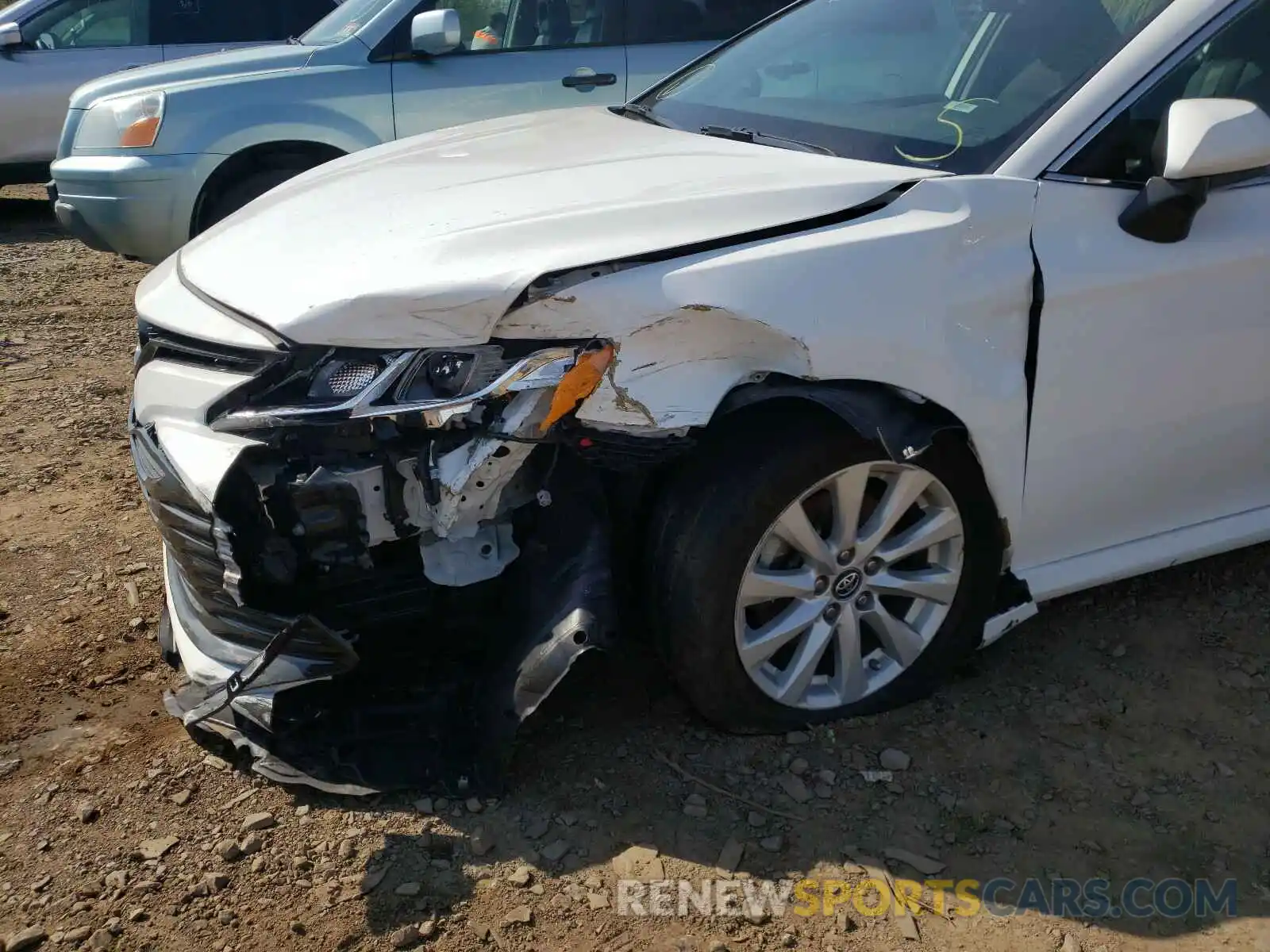 9 Photograph of a damaged car 4T1B11HK4KU219178 TOYOTA CAMRY 2019