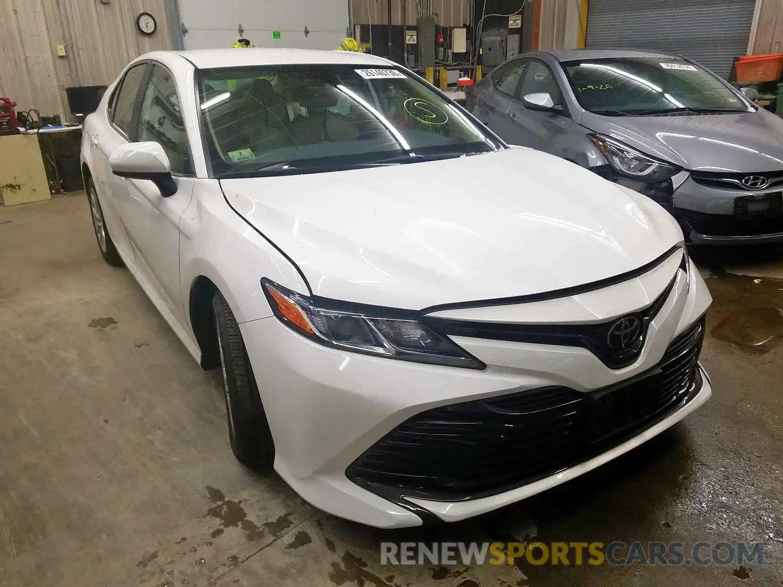 1 Photograph of a damaged car 4T1B11HK4KU219407 TOYOTA CAMRY 2019