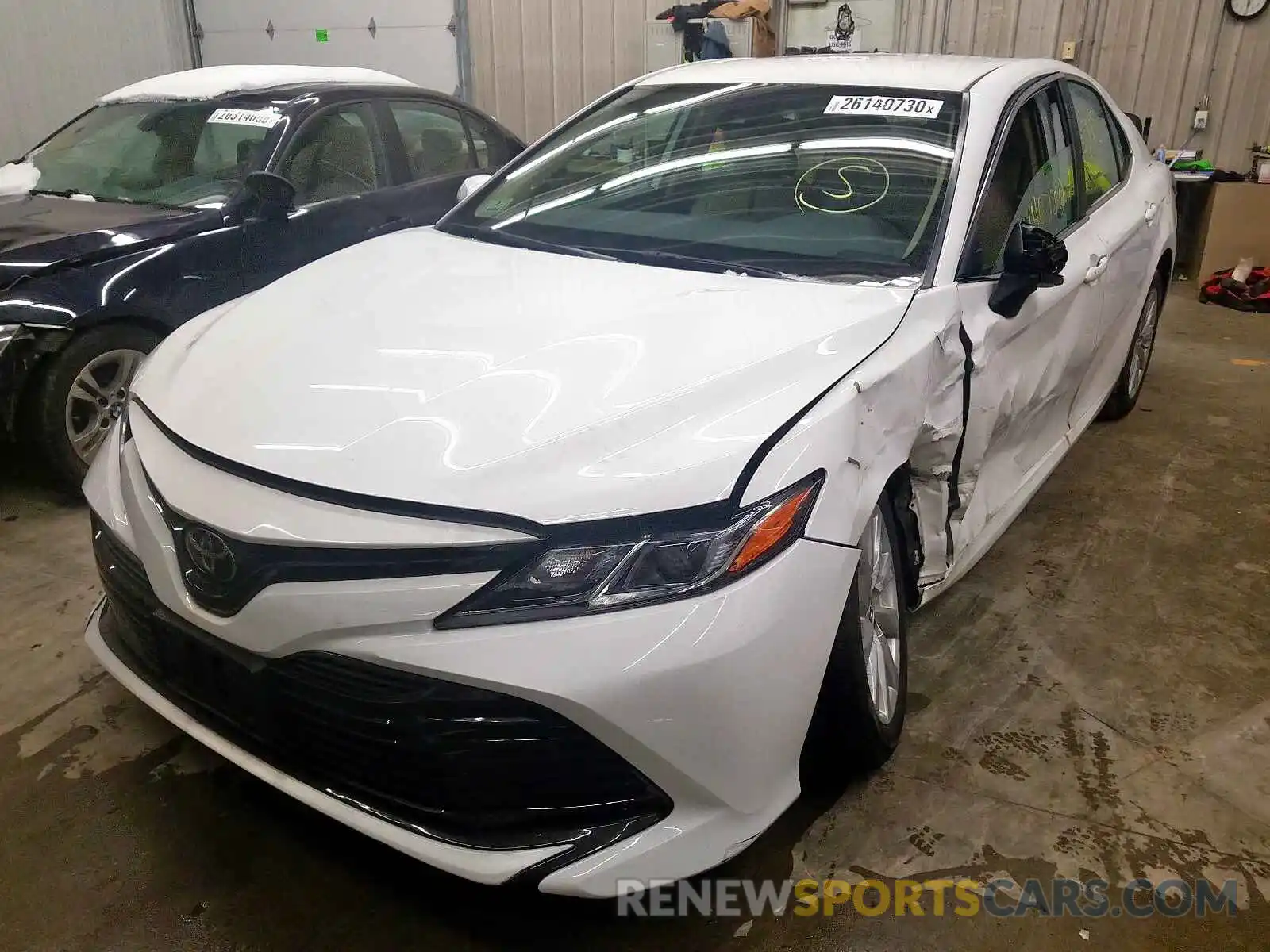 2 Photograph of a damaged car 4T1B11HK4KU219407 TOYOTA CAMRY 2019