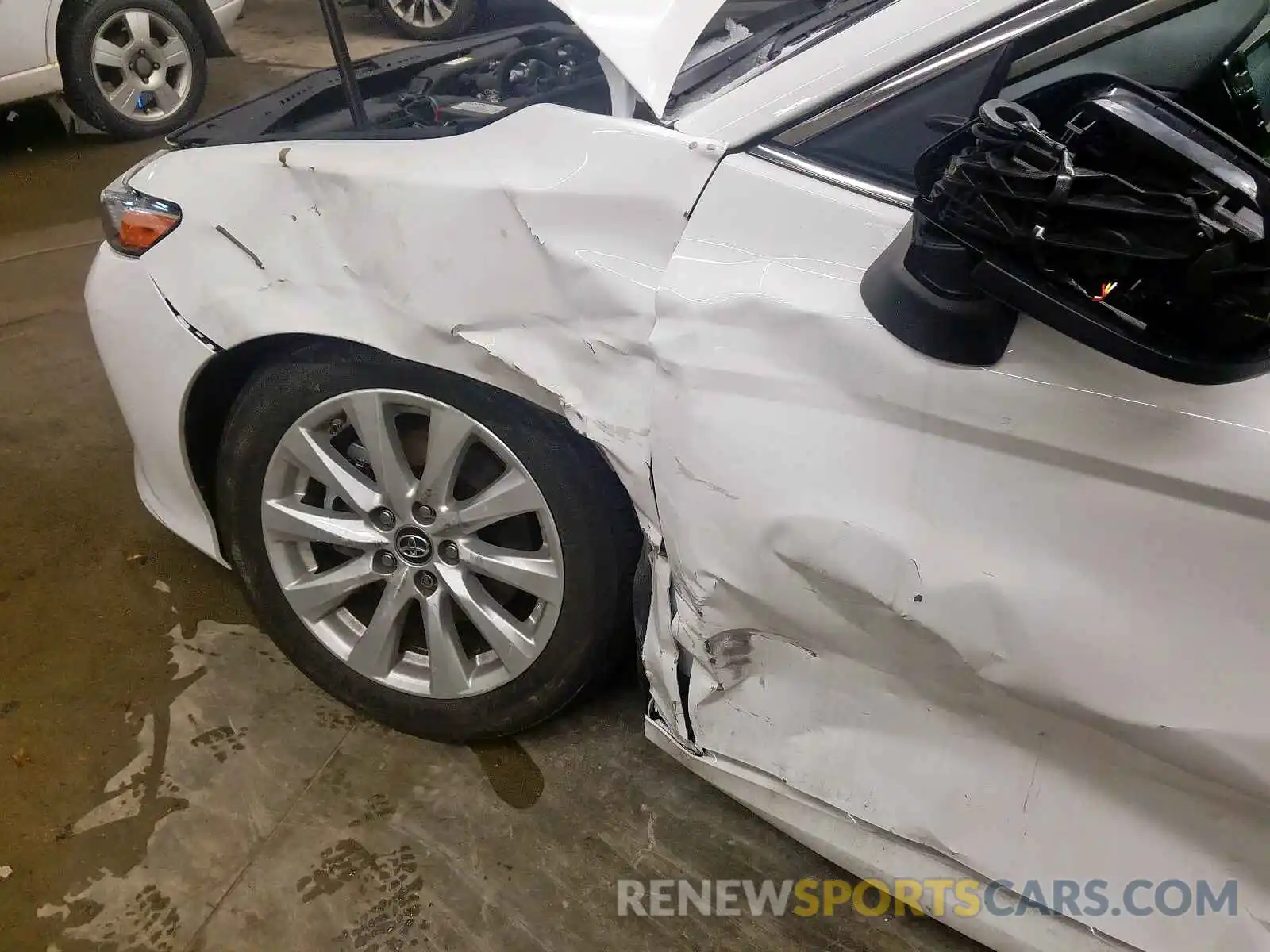 9 Photograph of a damaged car 4T1B11HK4KU219407 TOYOTA CAMRY 2019