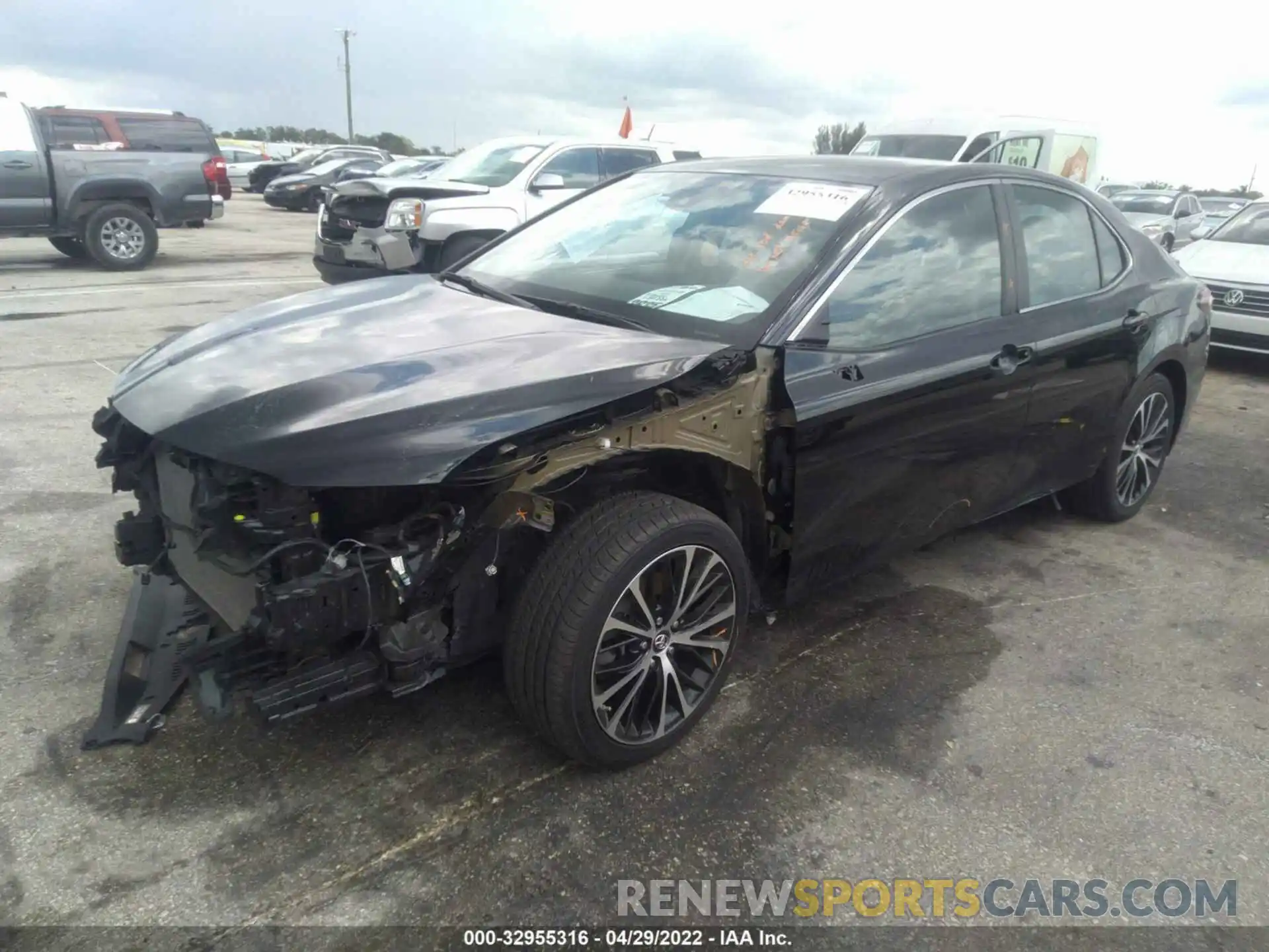 2 Photograph of a damaged car 4T1B11HK4KU220749 TOYOTA CAMRY 2019