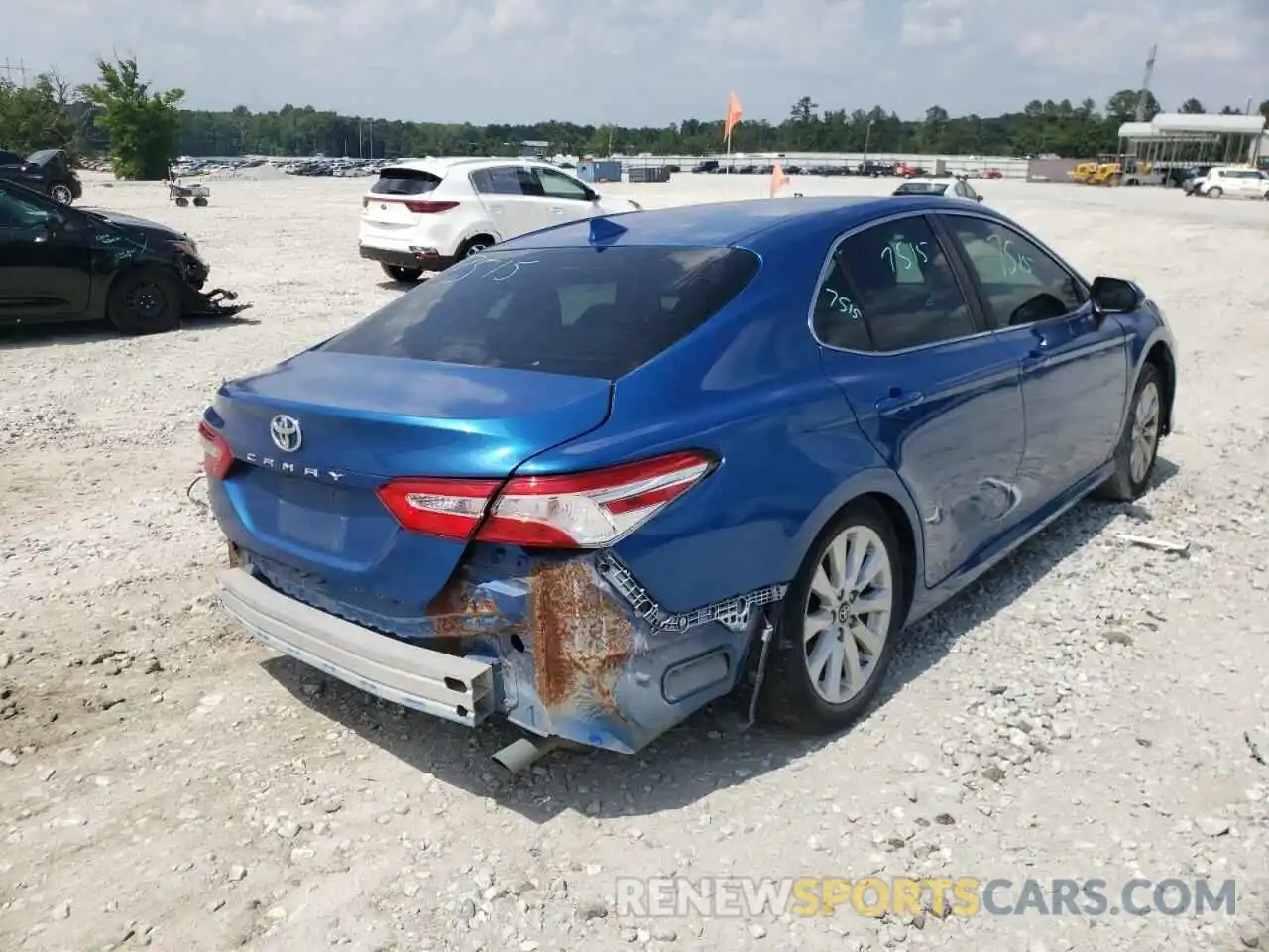 4 Photograph of a damaged car 4T1B11HK4KU221982 TOYOTA CAMRY 2019