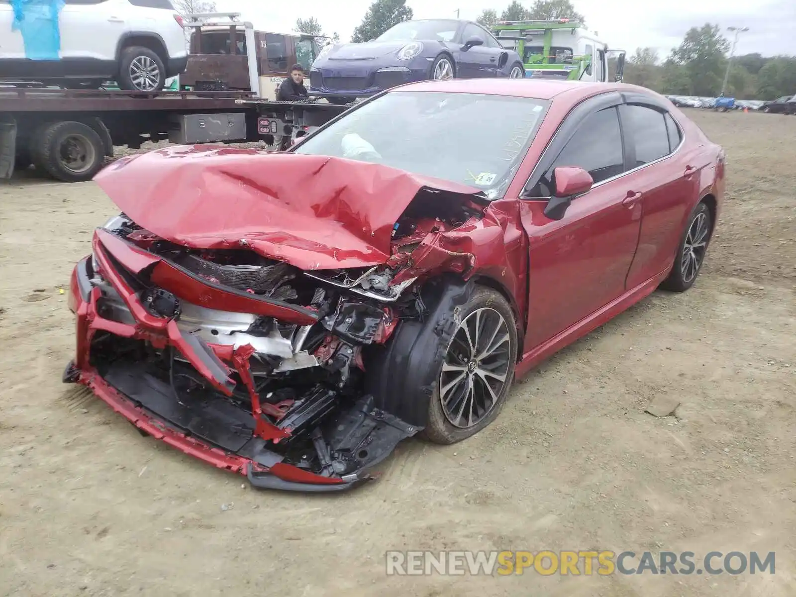 2 Photograph of a damaged car 4T1B11HK4KU223148 TOYOTA CAMRY 2019