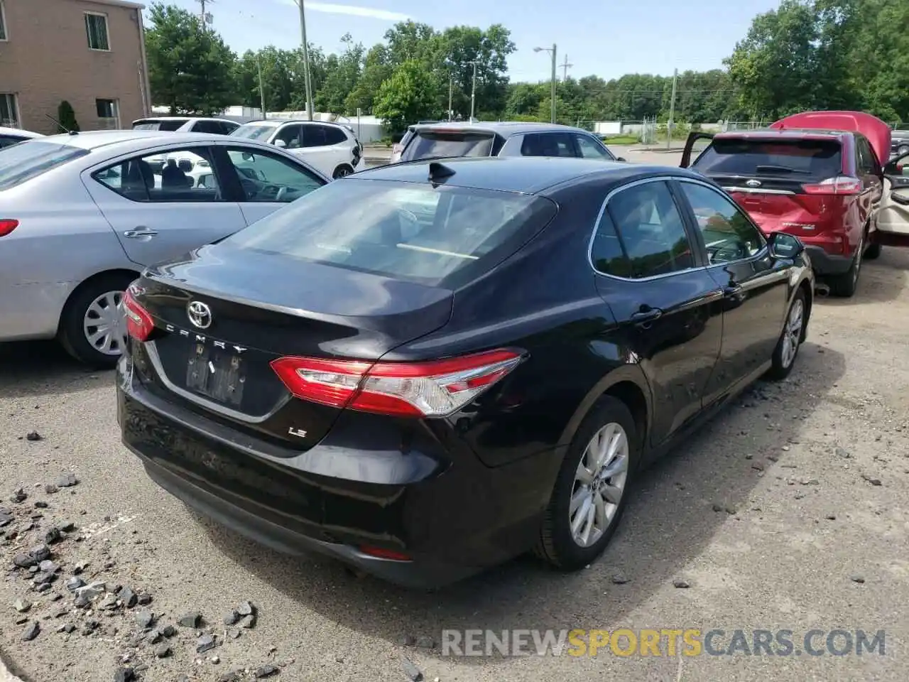 4 Photograph of a damaged car 4T1B11HK4KU228589 TOYOTA CAMRY 2019