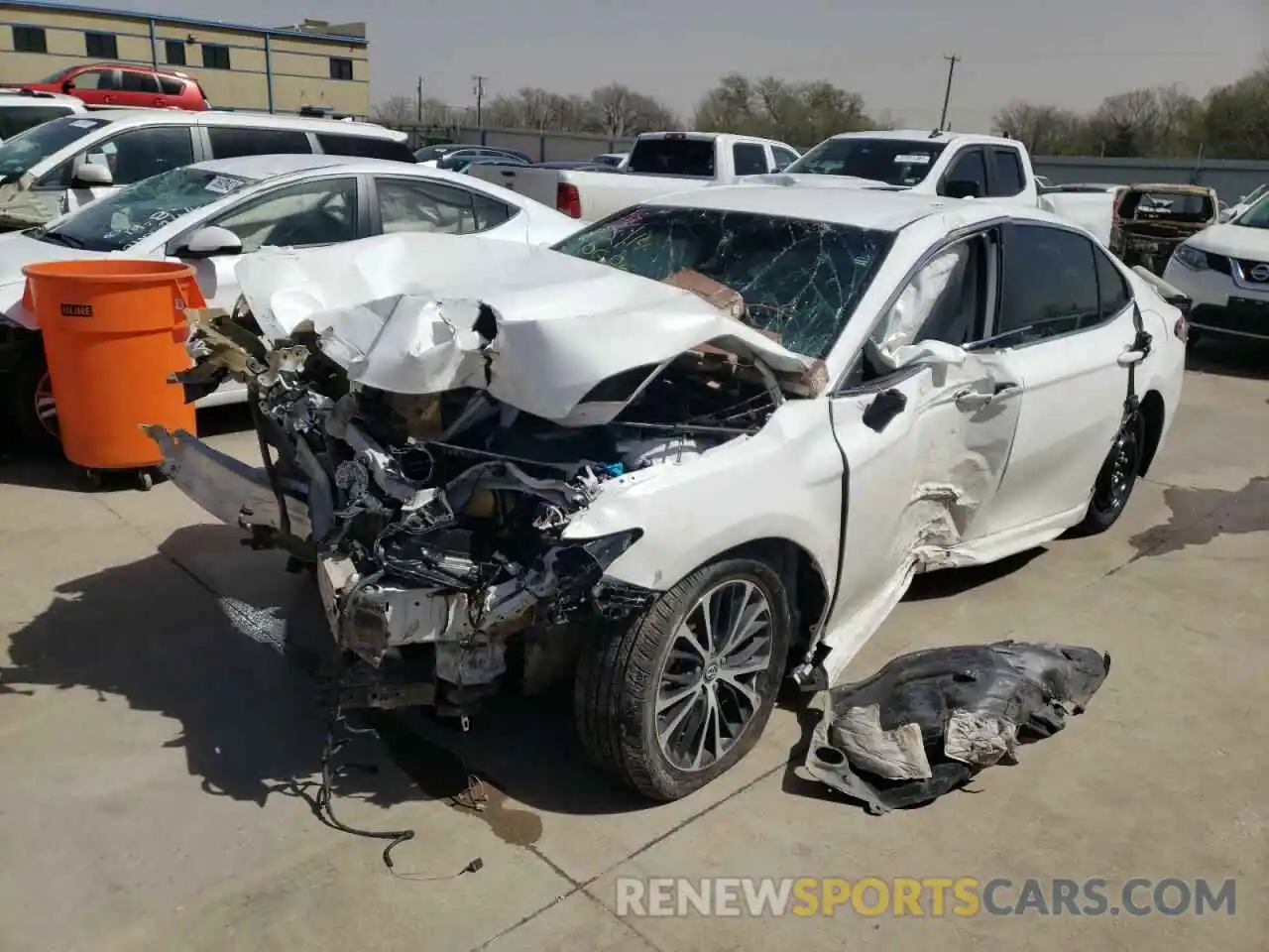 2 Photograph of a damaged car 4T1B11HK4KU229189 TOYOTA CAMRY 2019