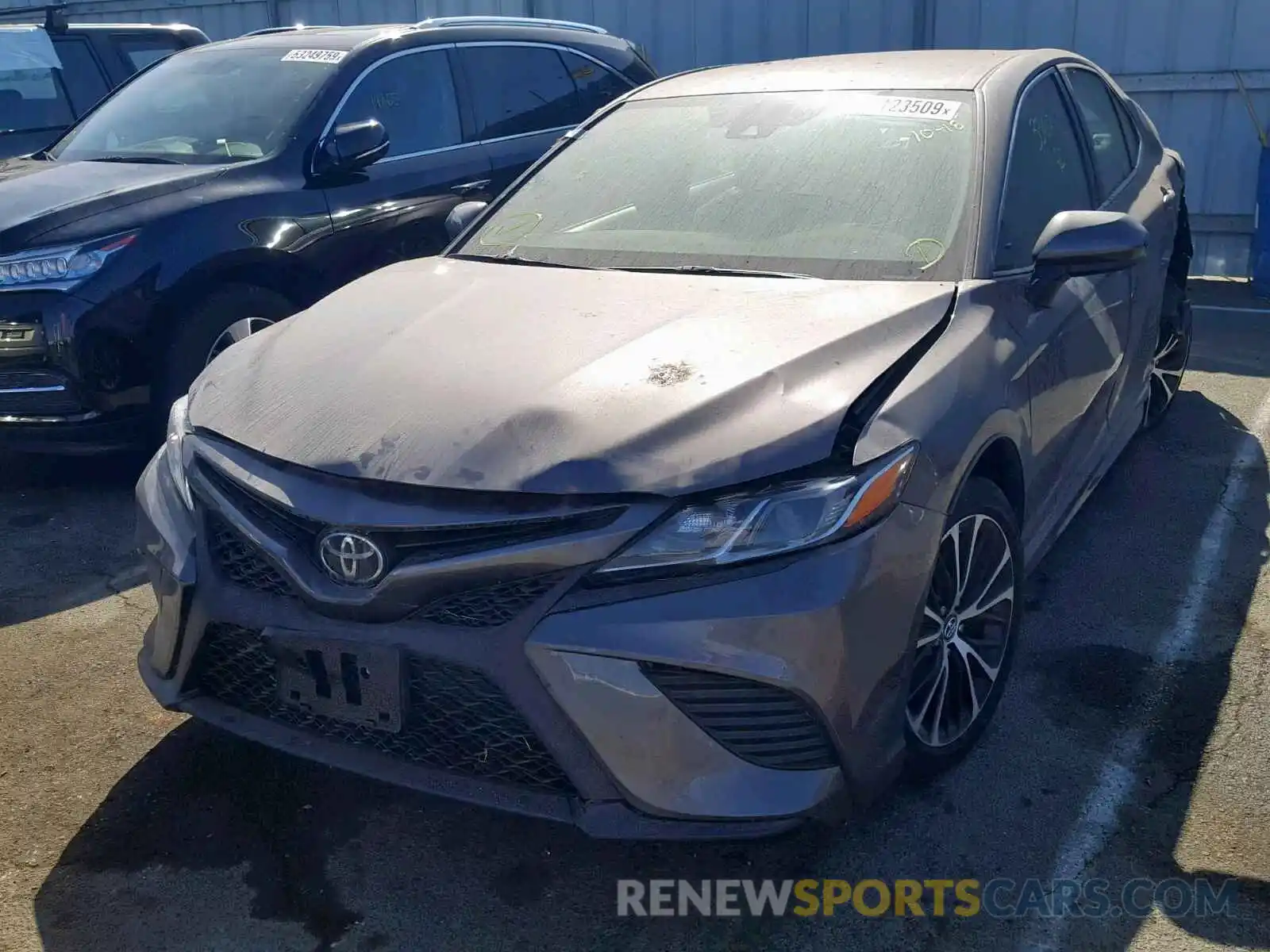 2 Photograph of a damaged car 4T1B11HK4KU229385 TOYOTA CAMRY 2019