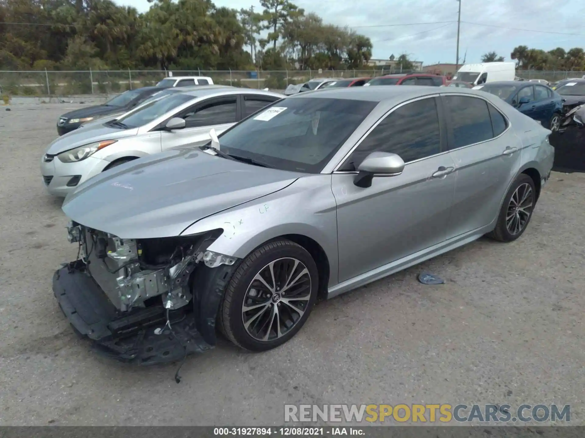 2 Photograph of a damaged car 4T1B11HK4KU230259 TOYOTA CAMRY 2019