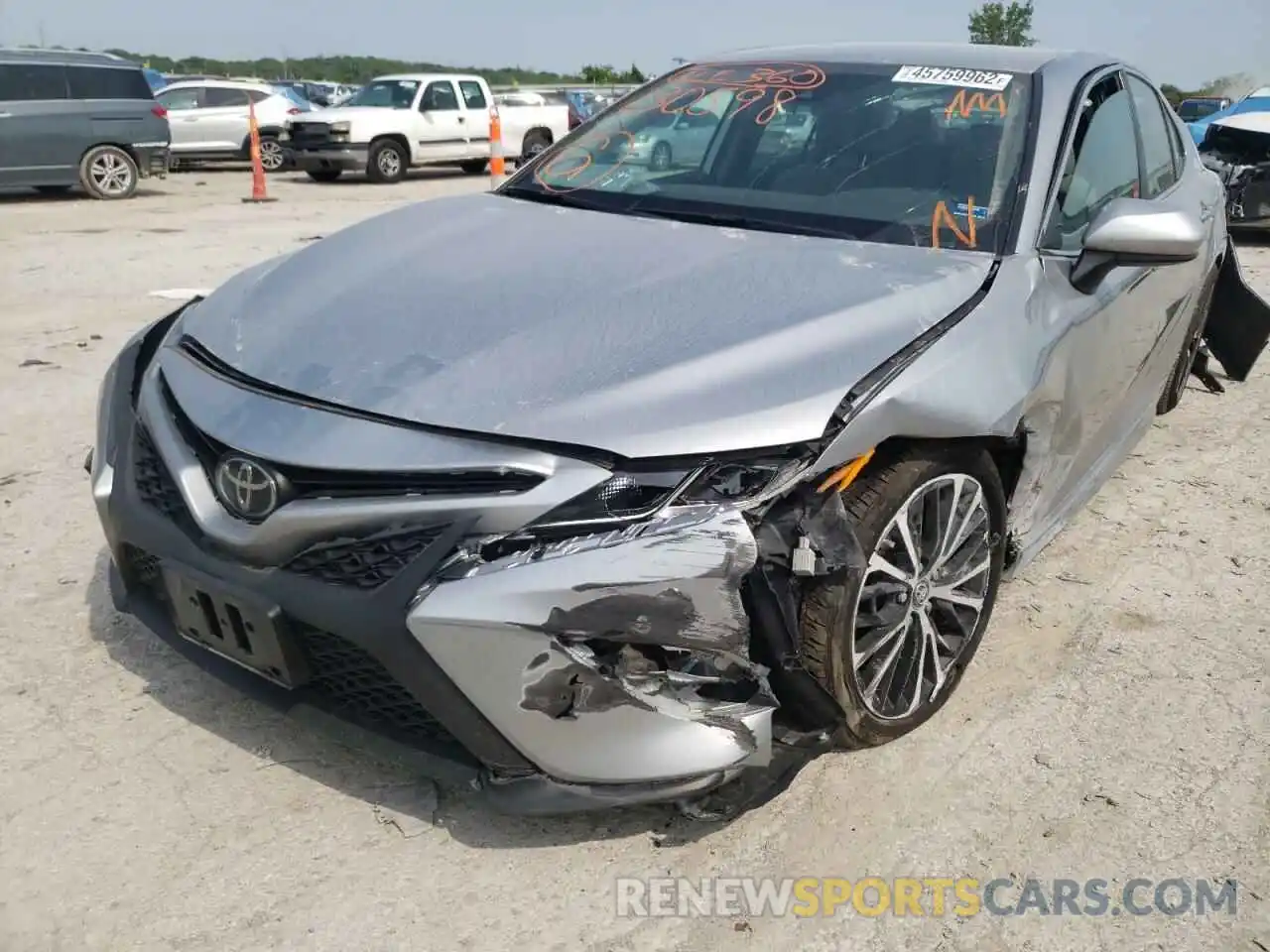 2 Photograph of a damaged car 4T1B11HK4KU230598 TOYOTA CAMRY 2019