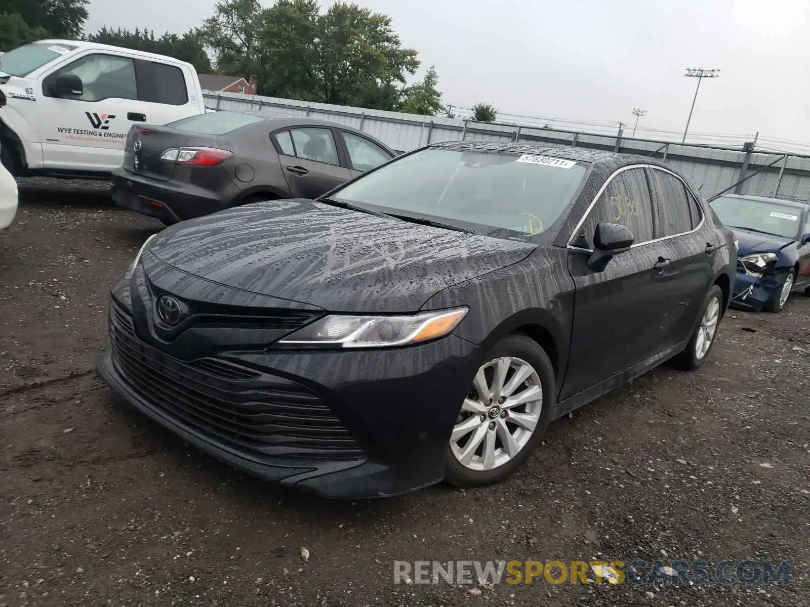 2 Photograph of a damaged car 4T1B11HK4KU231329 TOYOTA CAMRY 2019