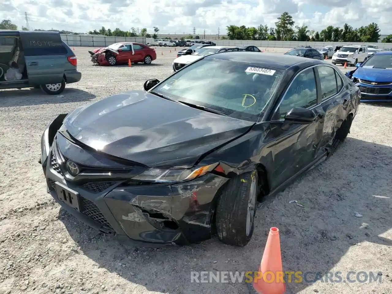 2 Photograph of a damaged car 4T1B11HK4KU231752 TOYOTA CAMRY 2019