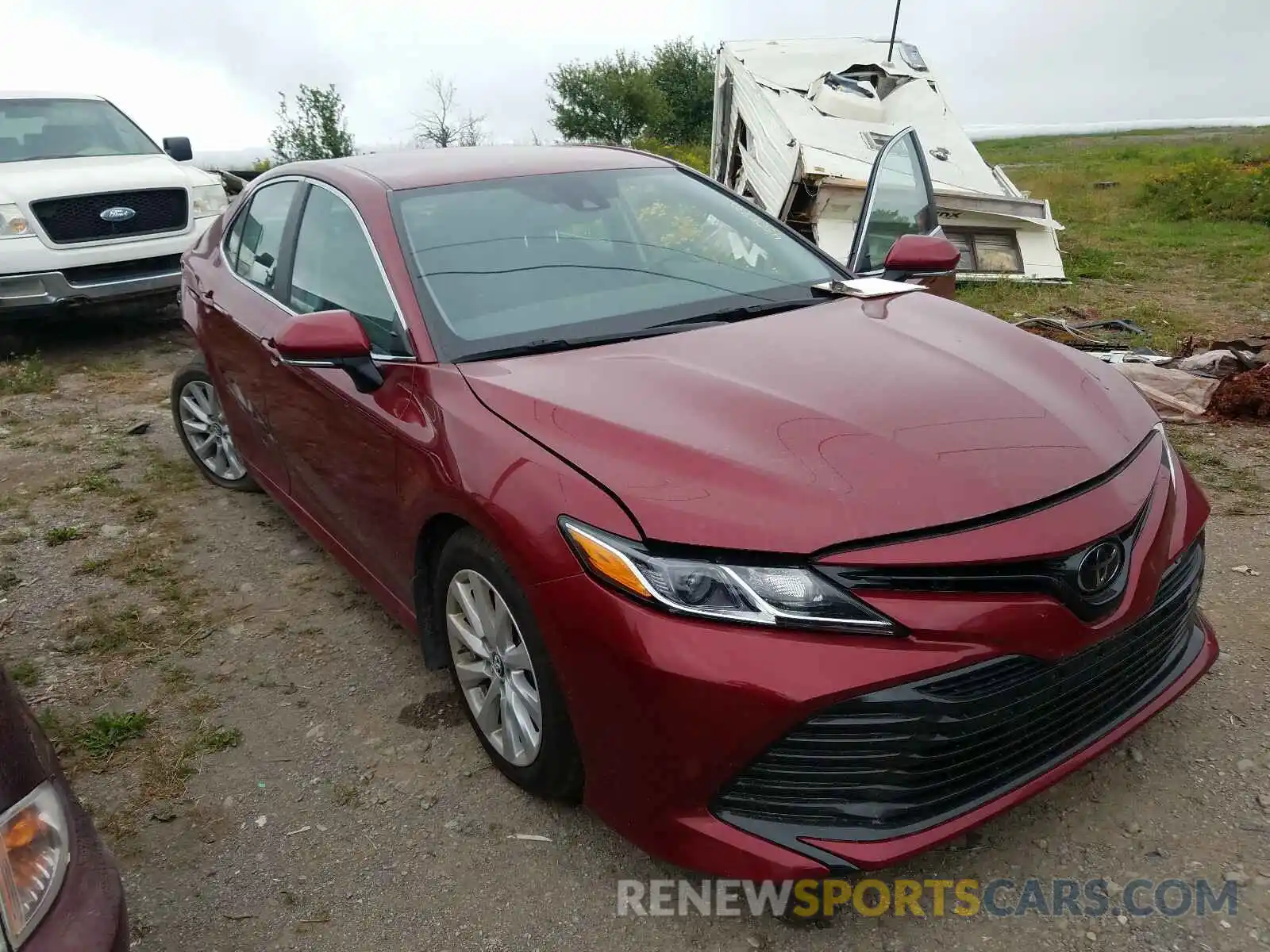 1 Photograph of a damaged car 4T1B11HK4KU233209 TOYOTA CAMRY 2019