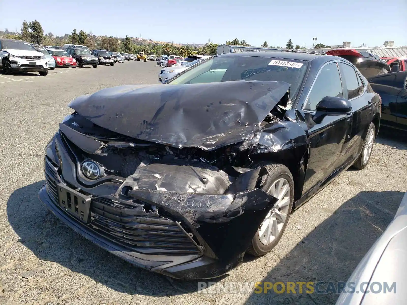 2 Photograph of a damaged car 4T1B11HK4KU234926 TOYOTA CAMRY 2019