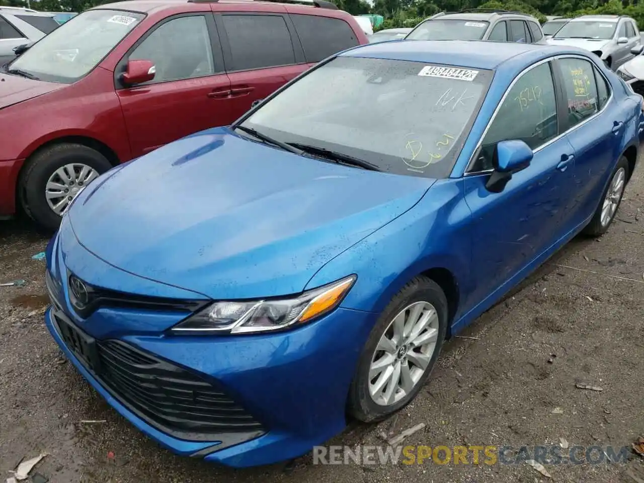 2 Photograph of a damaged car 4T1B11HK4KU235543 TOYOTA CAMRY 2019