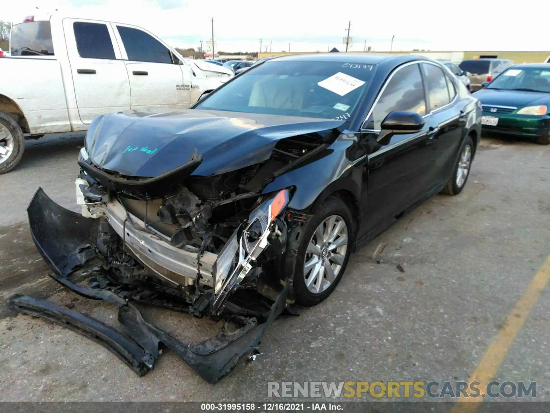 2 Photograph of a damaged car 4T1B11HK4KU238247 TOYOTA CAMRY 2019