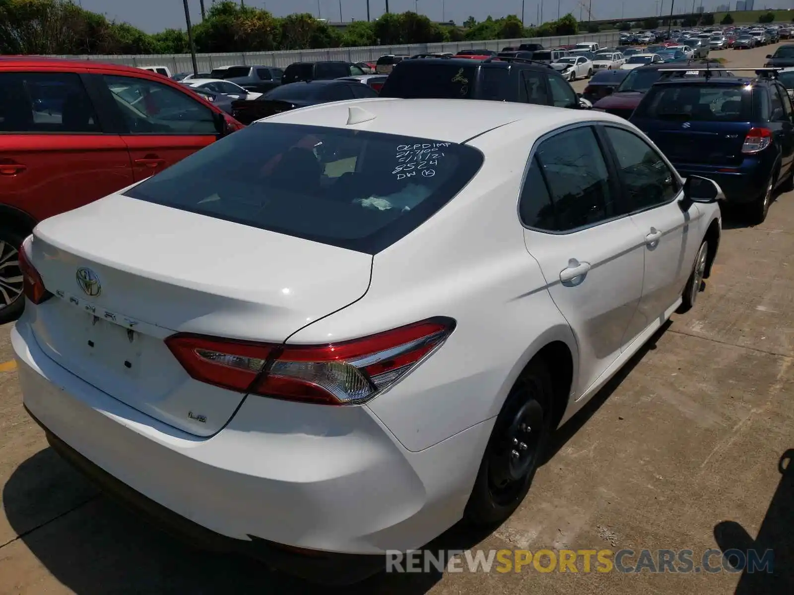 4 Photograph of a damaged car 4T1B11HK4KU238524 TOYOTA CAMRY 2019