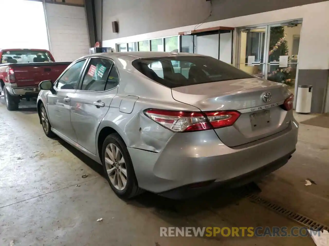 3 Photograph of a damaged car 4T1B11HK4KU240404 TOYOTA CAMRY 2019