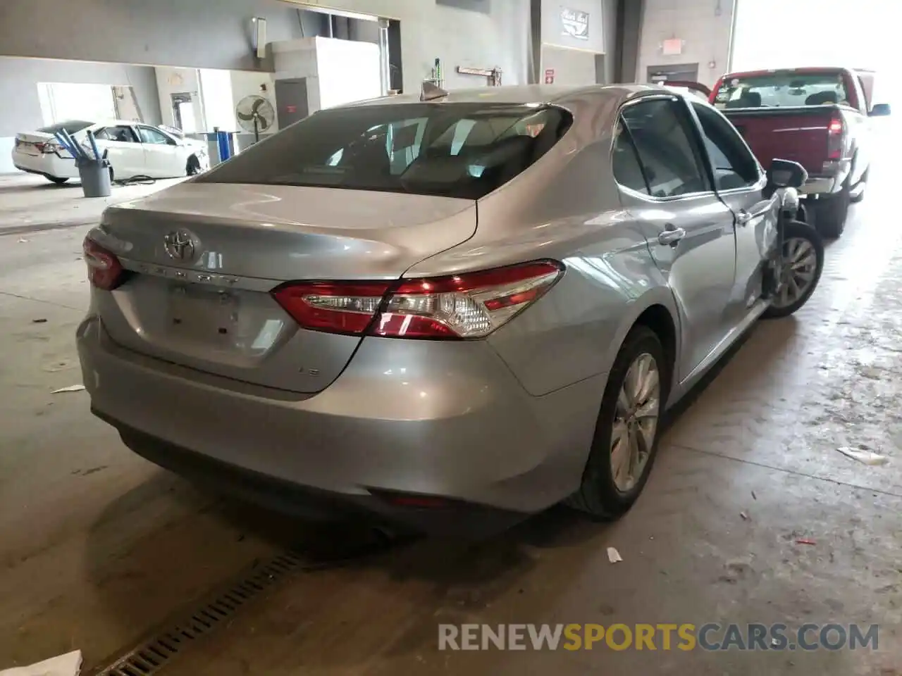 4 Photograph of a damaged car 4T1B11HK4KU240404 TOYOTA CAMRY 2019