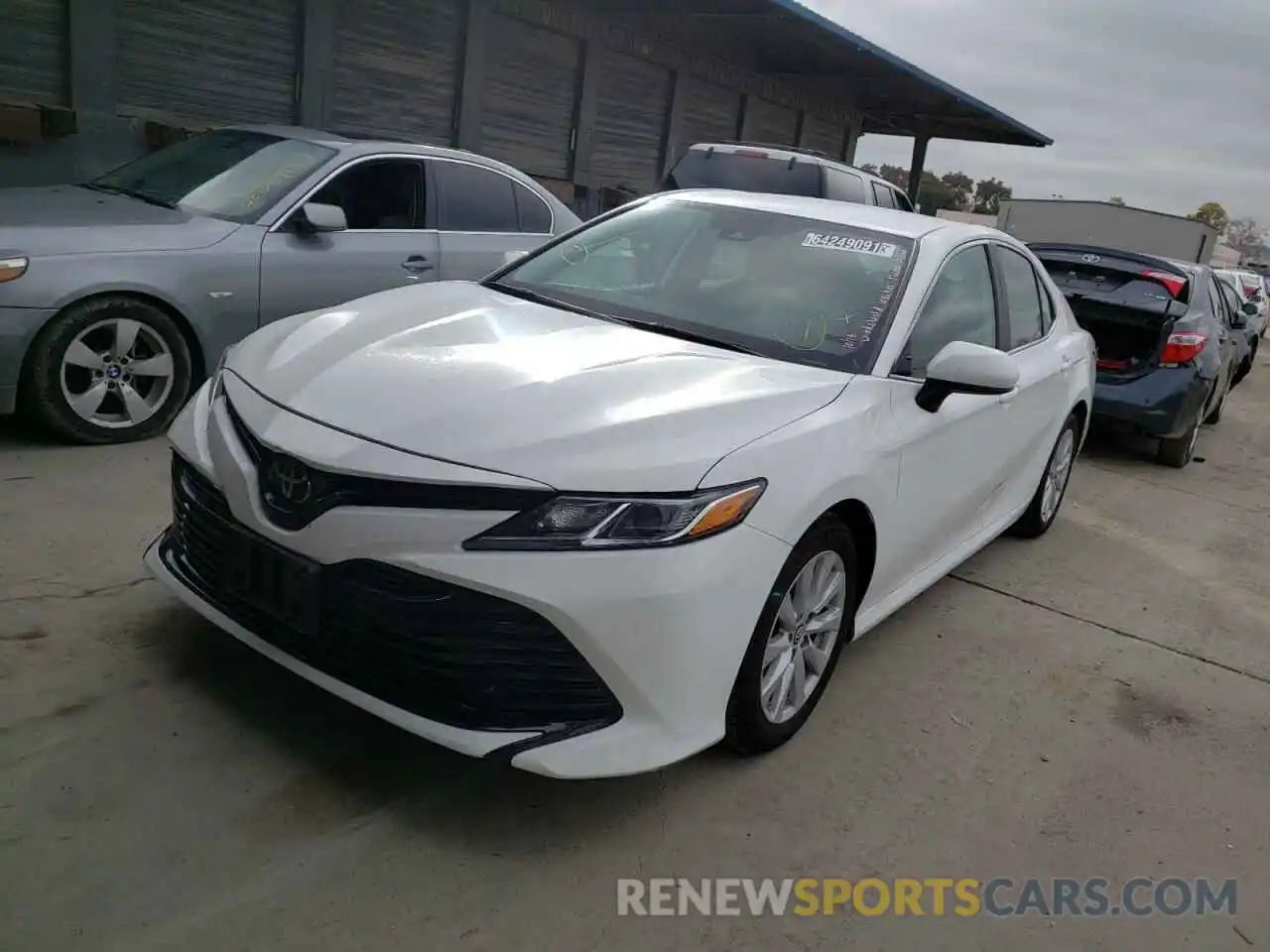 2 Photograph of a damaged car 4T1B11HK4KU241455 TOYOTA CAMRY 2019